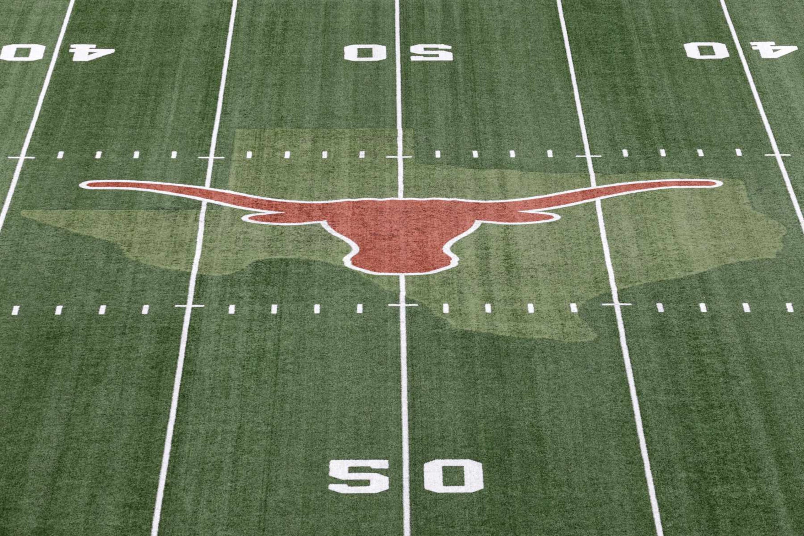 AUSTIN, TEXAS - SEPTEMBER 03: A view of the Texas Longhorns logo at midfield before the game \al at Darrell K Royal-Texas Memorial Stadium on September 03, 2022 in Austin, Texas. (Photo by Tim Warner/Getty Images) AUSTIN, TEXAS - SEPTEMBER 03: A view of the Texas Longhorns logo at midfield before the game \al at Darrell K Royal-Texas Memorial Stadium on September 03, 2022 in Austin, Texas. (Photo by Tim Warner/Getty Images)