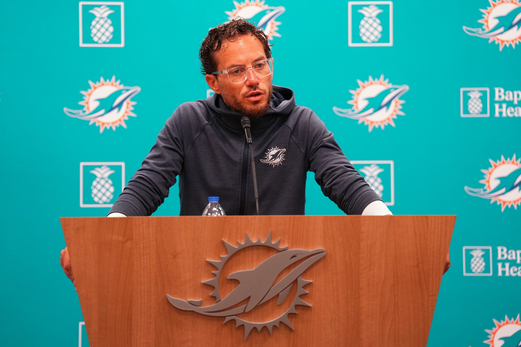 MIAMI GARDENS, FLORIDA - AUGUST 07: Miami Dolphins head coach Mike Mcdaniel speaks to the media prior to a joint practice with the Atlanta Falcons on August 07, 2024 in Miami Gardens, Florida. (Photo by Rich Storry/Getty Images)