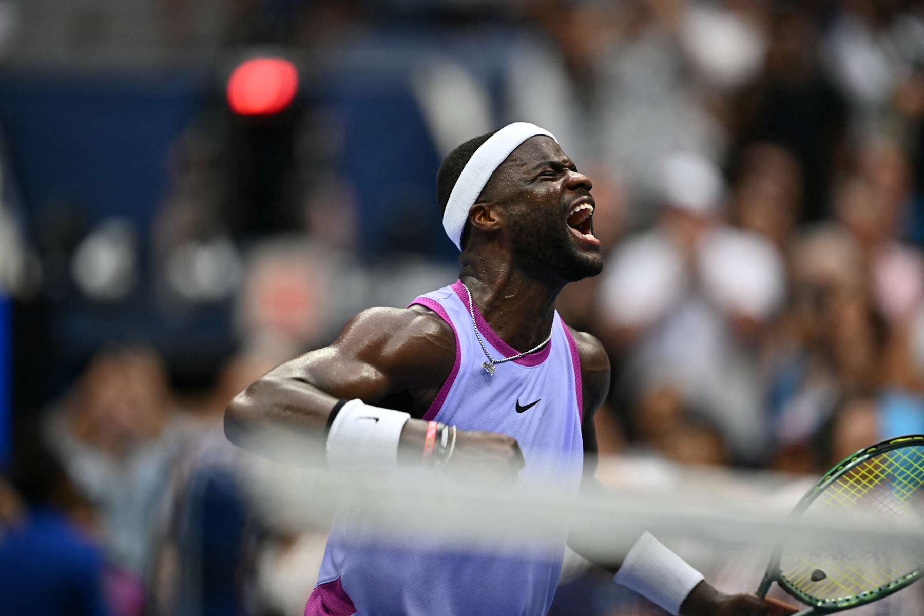 USA's Frances Tiafoe celebrates defeating USA's Ben Shelton in their men's singles third round match on day five of the US Open tennis tournament at the USTA Billie Jean King National Tennis Center in New York City, on August 30, 2024. (Photo by ANGELA WEISS / AFP) (Photo by ANGELA WEISS/AFP via Getty Images)