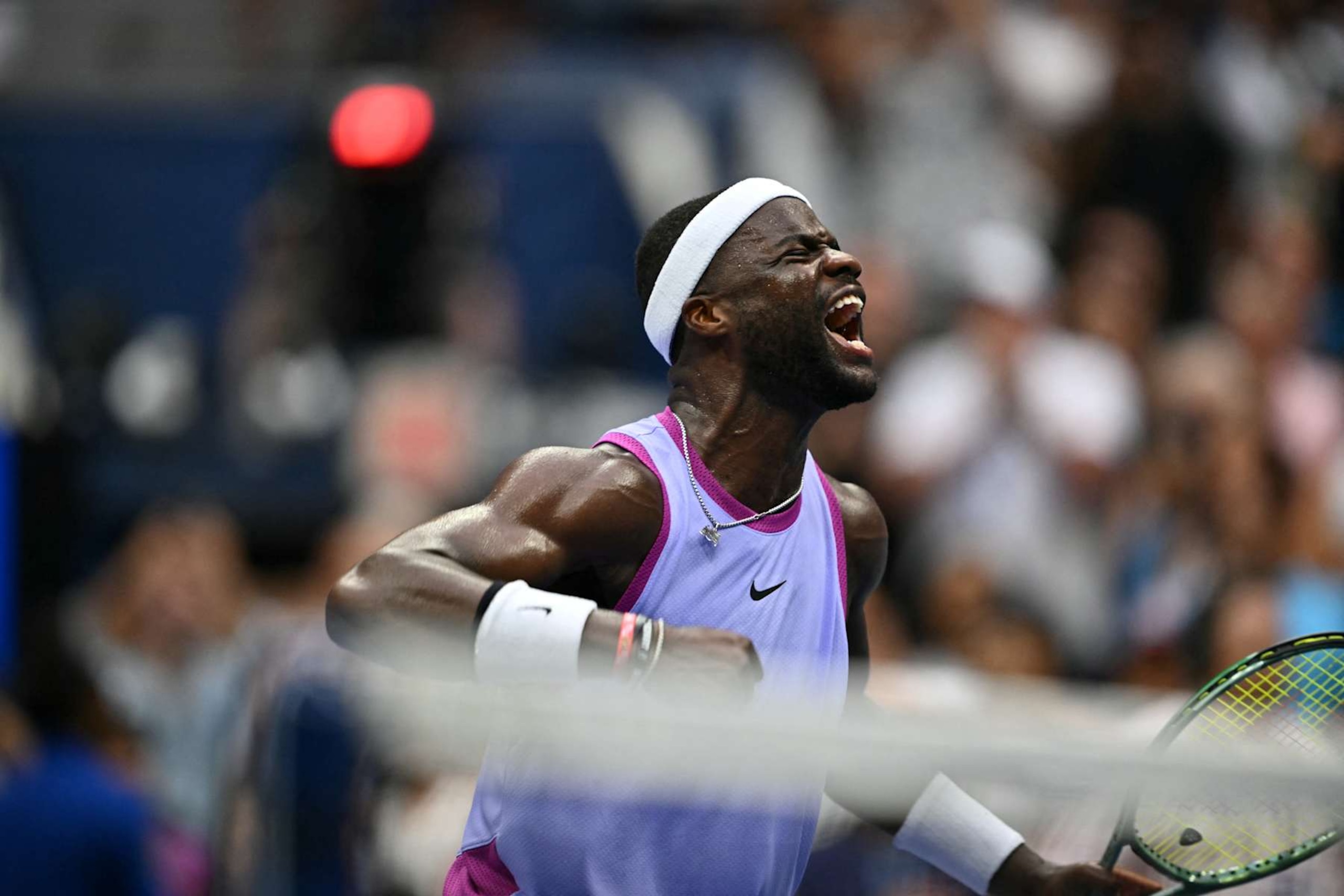 USA's Frances Tiafoe celebrates defeating USA's Ben Shelton in their men's singles third round match on day five of the US Open tennis tournament at the USTA Billie Jean King National Tennis Center in New York City, on August 30, 2024. (Photo by ANGELA WEISS / AFP) (Photo by ANGELA WEISS/AFP via Getty Images)