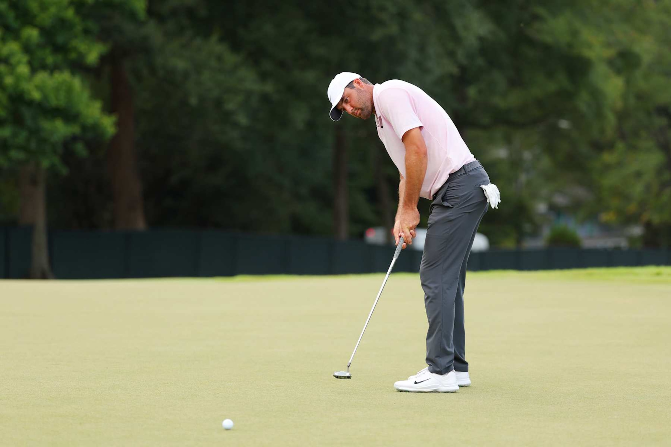 ATLANTA, GEORGIA - AUGUST 30: Scottie Scheffler of the United States putts on the 12th green during the second round of the TOUR Championship at East Lake Golf Club on August 30, 2024 in Atlanta, Georgia. (Photo by Kevin C. Cox/Getty Images)