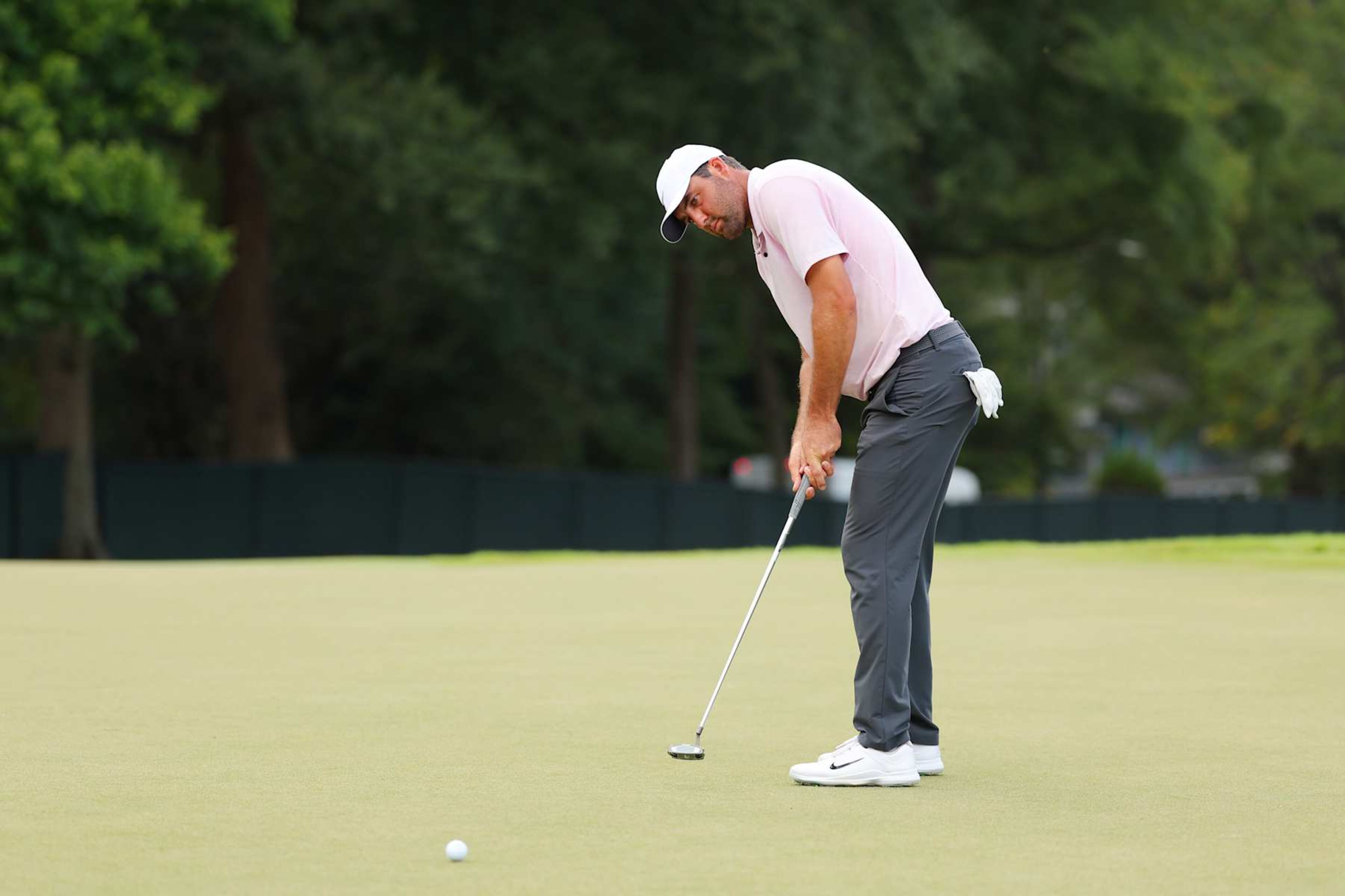 ATLANTA, GEORGIA - AUGUST 30: Scottie Scheffler of the United States putts on the 12th green during the second round of the TOUR Championship at East Lake Golf Club on August 30, 2024 in Atlanta, Georgia. (Photo by Kevin C. Cox/Getty Images)