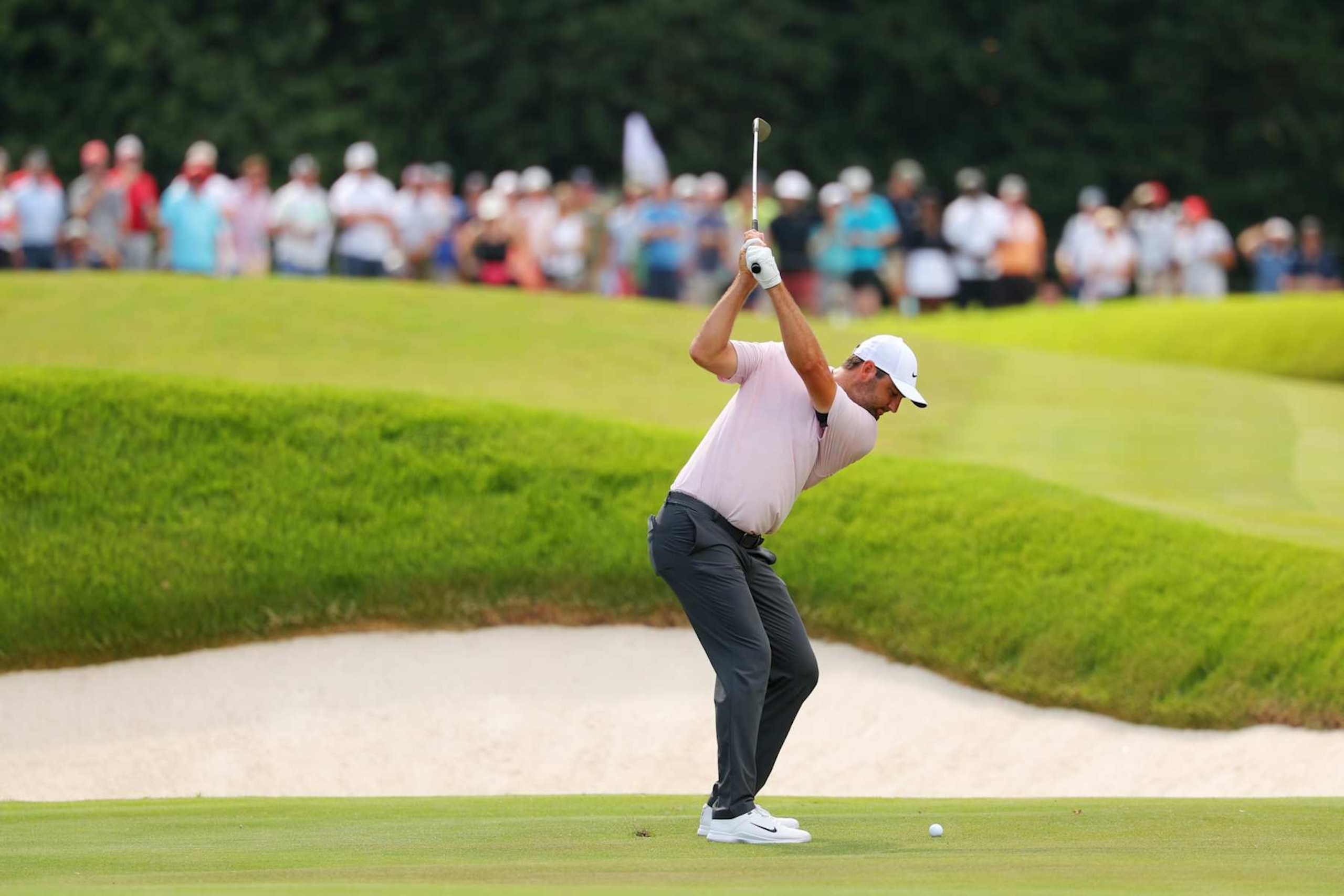 ATLANTA, GEORGIA - AUGUST 30: Scottie Scheffler of the United States plays a shot on the 12th hole during the second round of the TOUR Championship at East Lake Golf Club on August 30, 2024 in Atlanta, Georgia. (Photo by Kevin C. Cox/Getty Images)