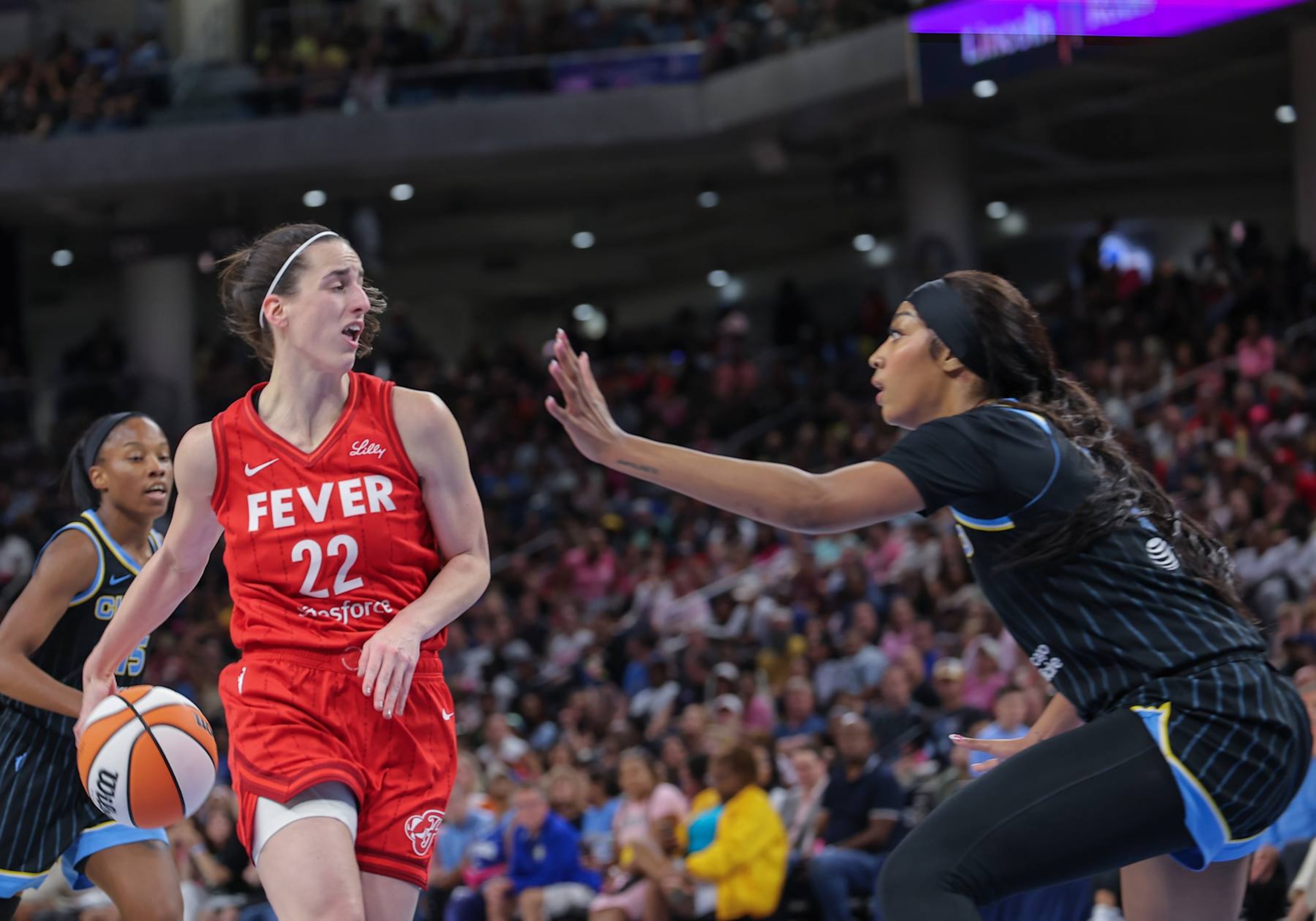 CHICAGO, IL - AUGUST 30: Angel Reese #5 of the Chicago Sky guards  Caitlin Clark #22 of the Indiana Fever
during the first half of a  WNBA game on August 30, 2024 at Wintrust Arena in Chicago, Illinois. (Photo by Melissa Tamez/Icon Sportswire via Getty Images)