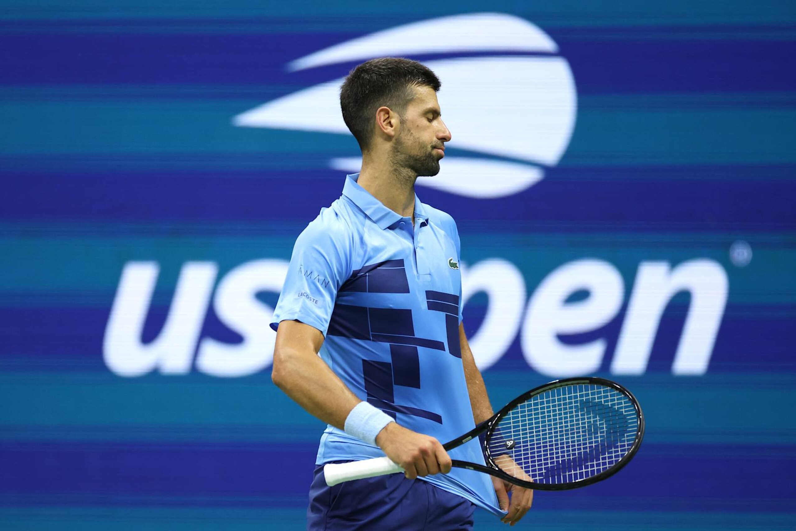 NEW YORK, NEW YORK - AUGUST 30: Novak Djokovic of Serbia reacts after a point against Alexei Popyrin of Australia during their Men's Singles Third Round match on Day Five of the 2024 US Open at USTA Billie Jean King National Tennis Center on August 30, 2024 in the Flushing neighborhood of the Queens borough of New York City. (Photo by Sarah Stier/Getty Images)