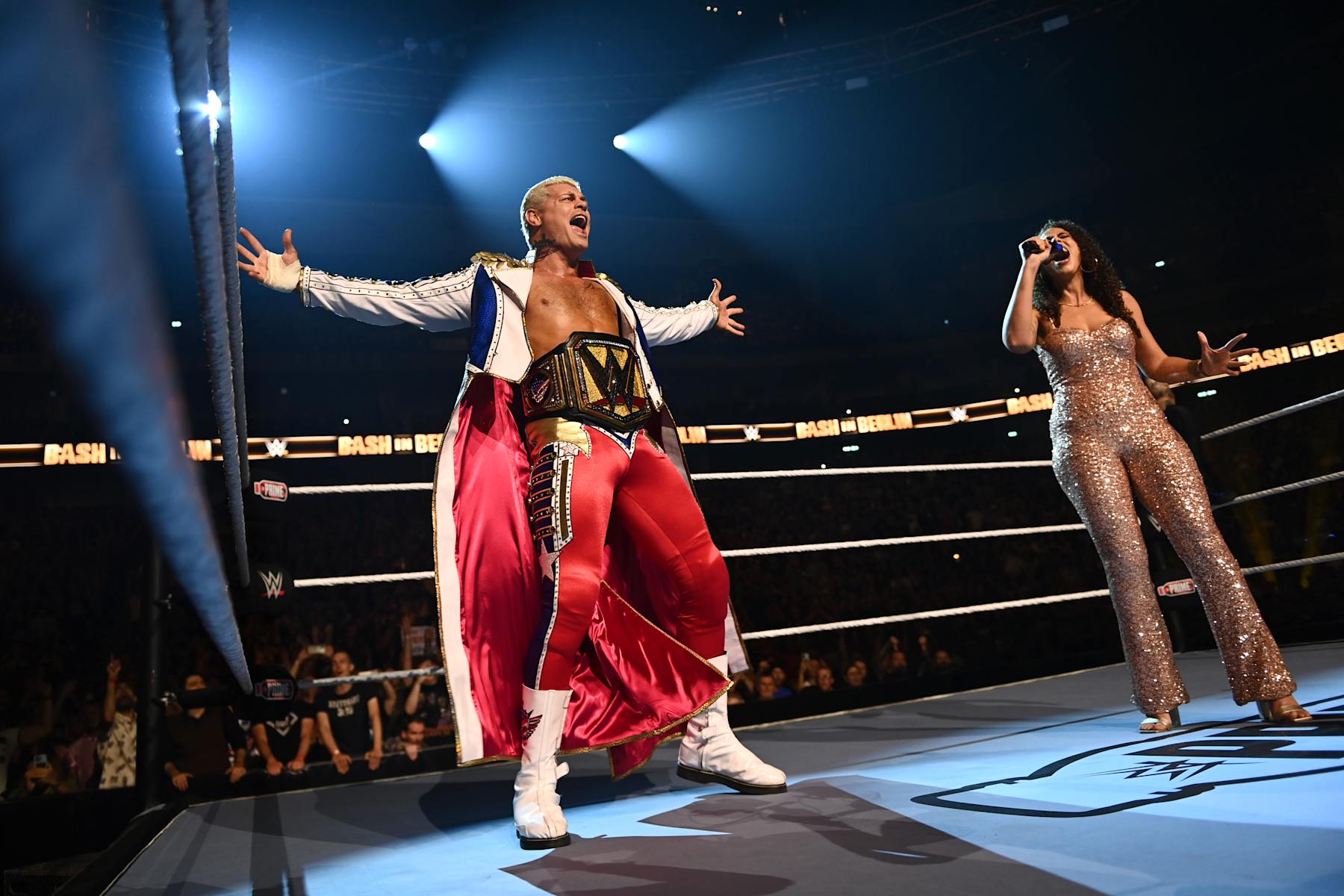 BERLIN, GERMANY - AUGUST 31: (L-R) WWE Undisputed Universal Champion Cody Rhodes is introduced by announcer Samantha Irvin during the WWE Bash in Berlin Premium Live Event at Uber Arena on August 31, 2024 in Berlin, Berlin. (Photo by WWE/Getty Images)