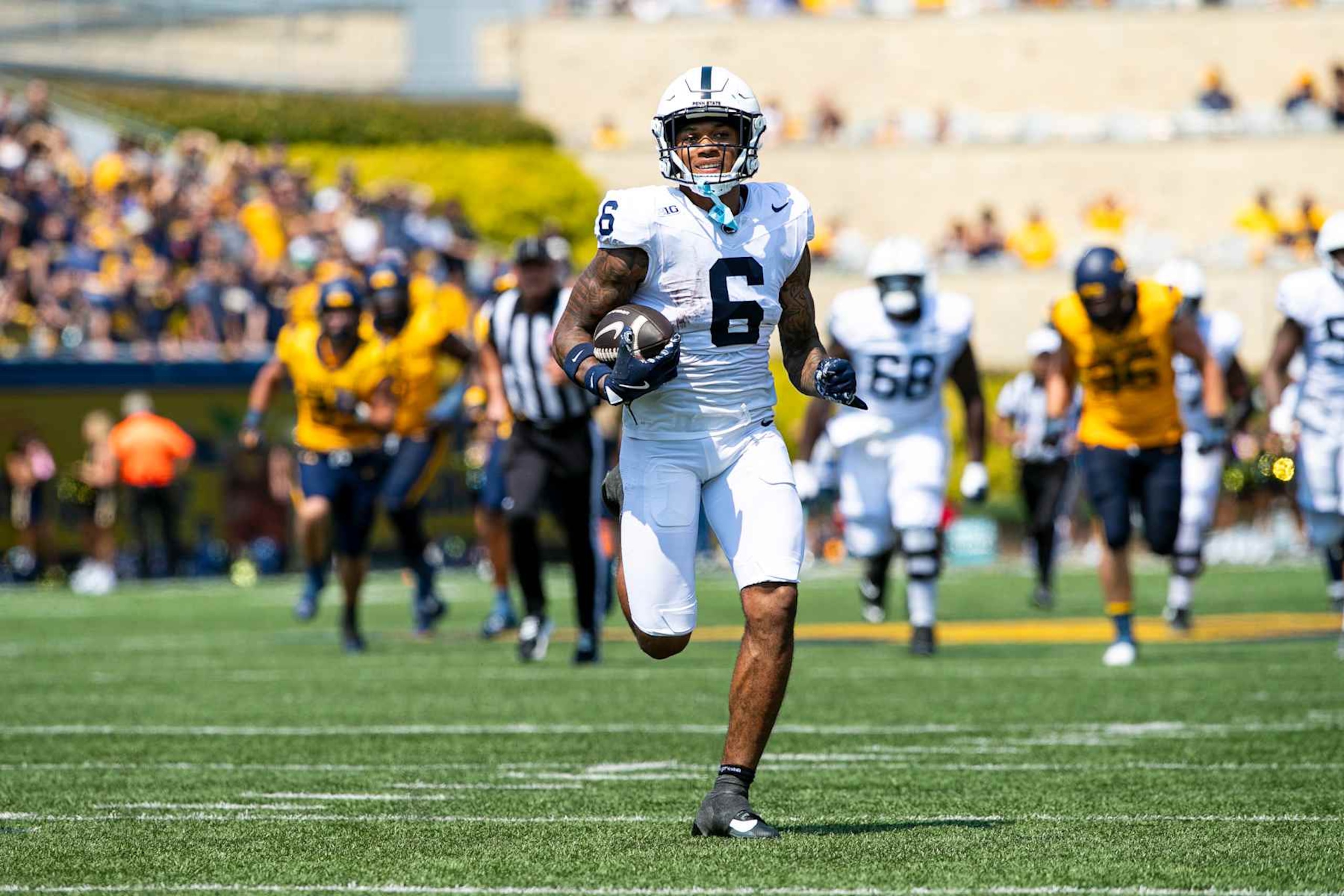 MORGANTOWN, WV - AUGUST 31: Penn State Nittany Lions wide receiver Harrison Wallace III (6) runs after making a catch during the college football game between the Penn State Nittany Lions and the West Virginia Mountaineers on August 31, 2024 at Mountaineer Field at Milan Puskar Stadium in Morgantown, WV. (Photo by Mark Alberti/Icon Sportswire via Getty Images)