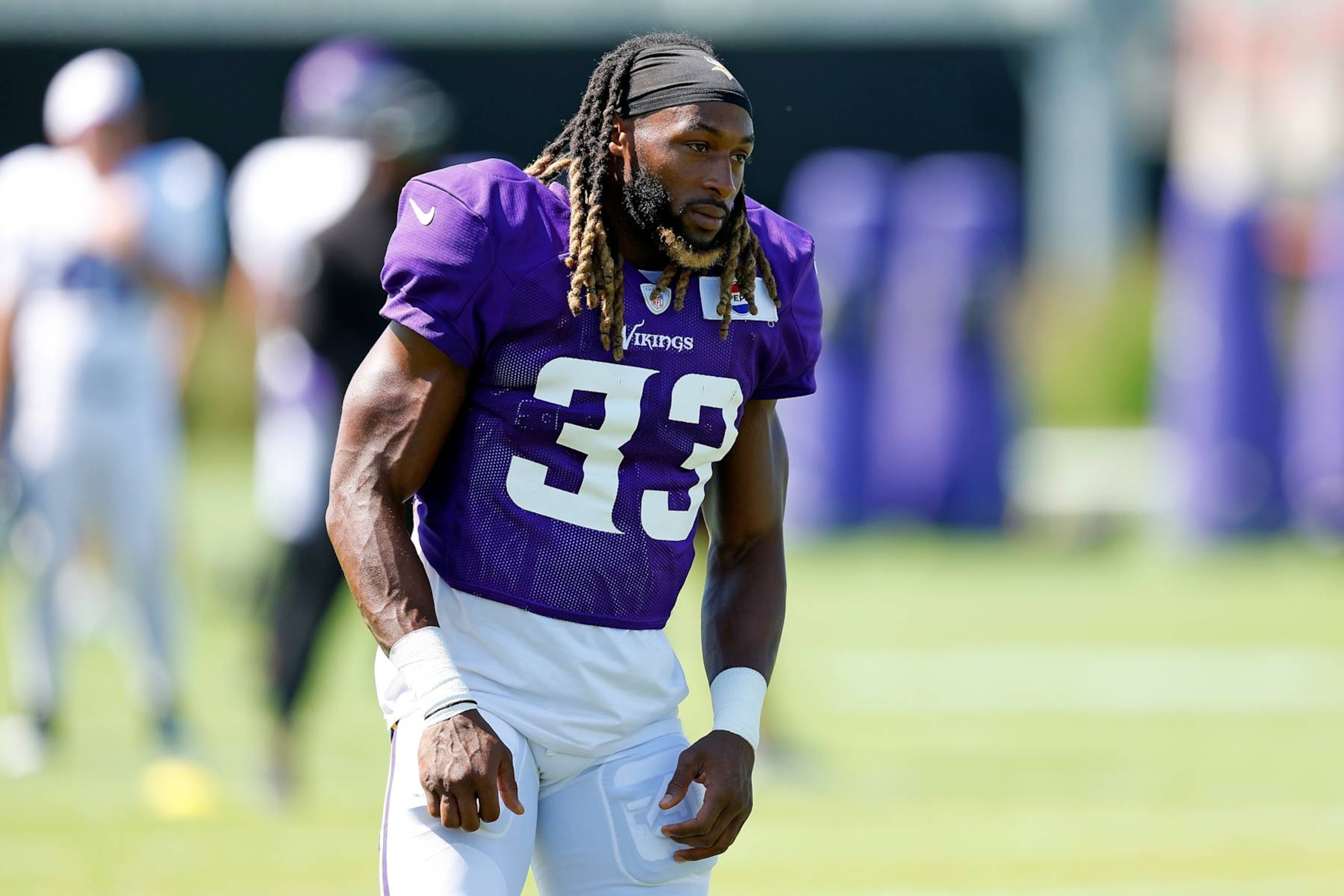 EAGAN, MINNESOTA - AUGUST 02: Aaron Jones #33 of the Minnesota Vikings looks on during training camp on August 02, 2024 in Eagan, Minnesota. (Photo by David Berding/Getty Images)