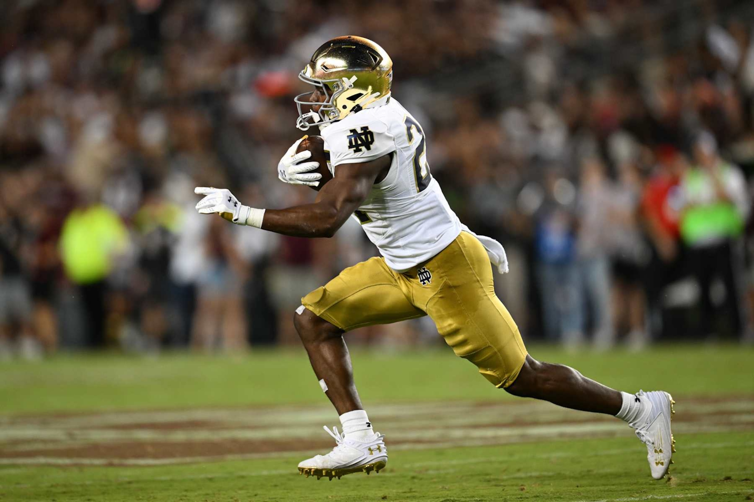 COLLEGE STATION, TEXAS - AUGUST 31: Jadarian Price #24 of the Notre Dame Fighting Irish runs the ball against the Texas A&M Aggies during the second quarter at Kyle Field on August 31, 2024 in College Station, Texas. (Photo by Jack Gorman/Getty Images)