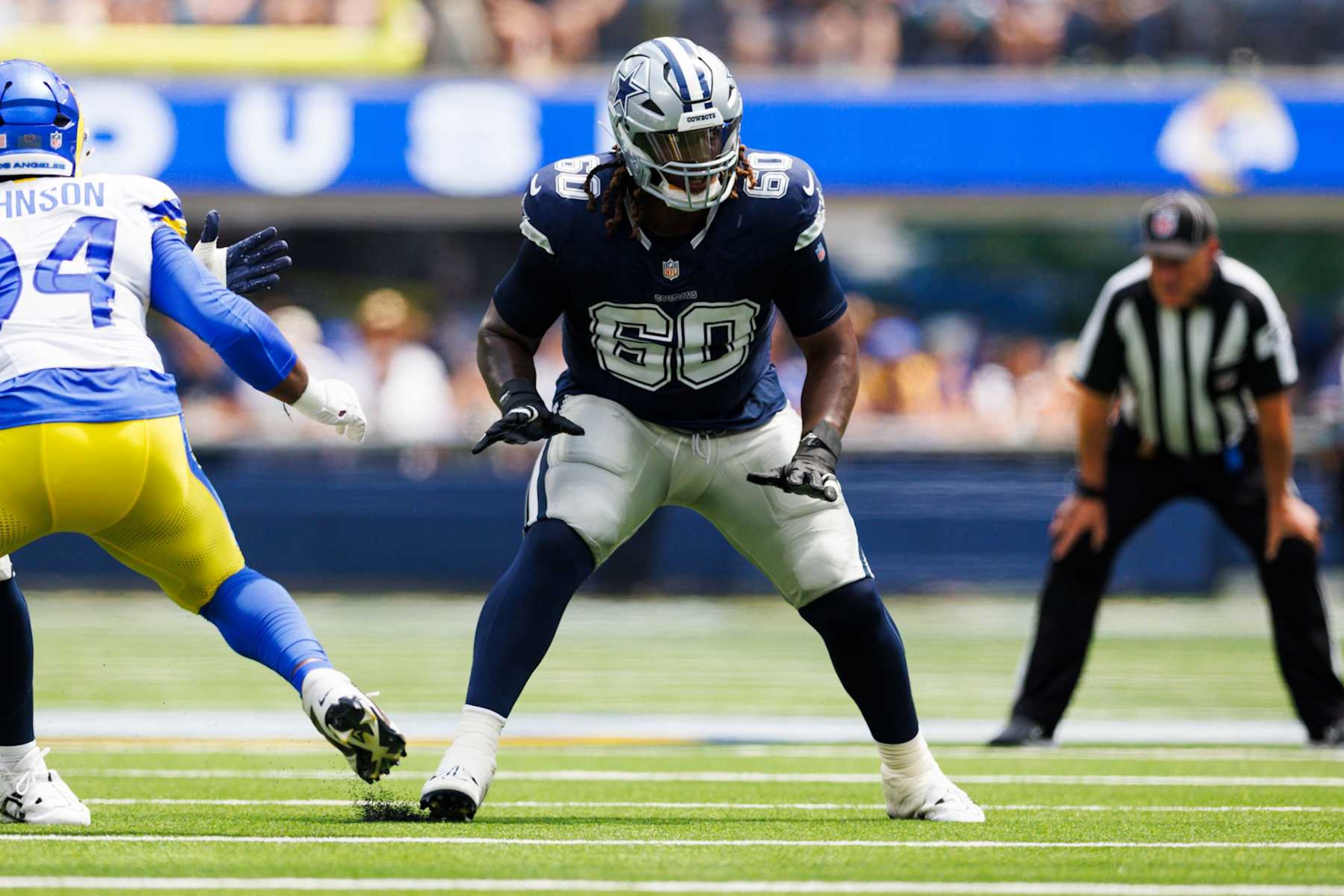 INGLEWOOD, CALIFORNIA - AUGUST 11: Tyler Guyton #60 of the Dallas Cowboys blocks during a preseason game against the Los Angeles Rams at SoFi Stadium on August 11, 2024 in Inglewood, California. (Photo by Ric Tapia/Getty Images) INGLEWOOD, CALIFORNIA - AUGUST 11: Tyler Guyton #60 of the Dallas Cowboys blocks during a preseason game against the Los Angeles Rams at SoFi Stadium on August 11, 2024 in Inglewood, California. (Photo by Ric Tapia/Getty Images)
