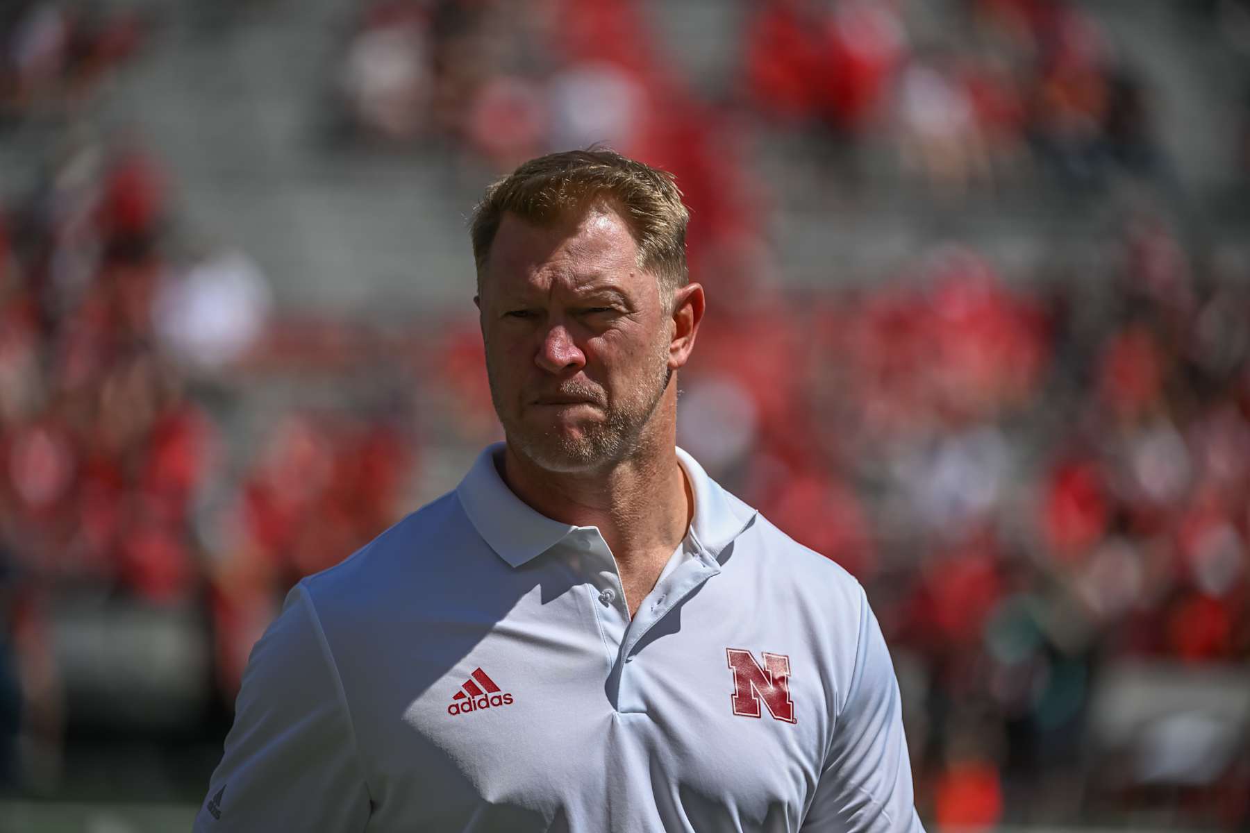 LINCOLN, NE - SEPTEMBER 3: Head coach Scott Frost of the Nebraska Cornhuskers watches the team warm up before the game against the North Dakota Fighting Hawks at Memorial Stadium on September 3, 2022 in Lincoln, Nebraska. (Photo by Steven Branscombe/Getty Images)