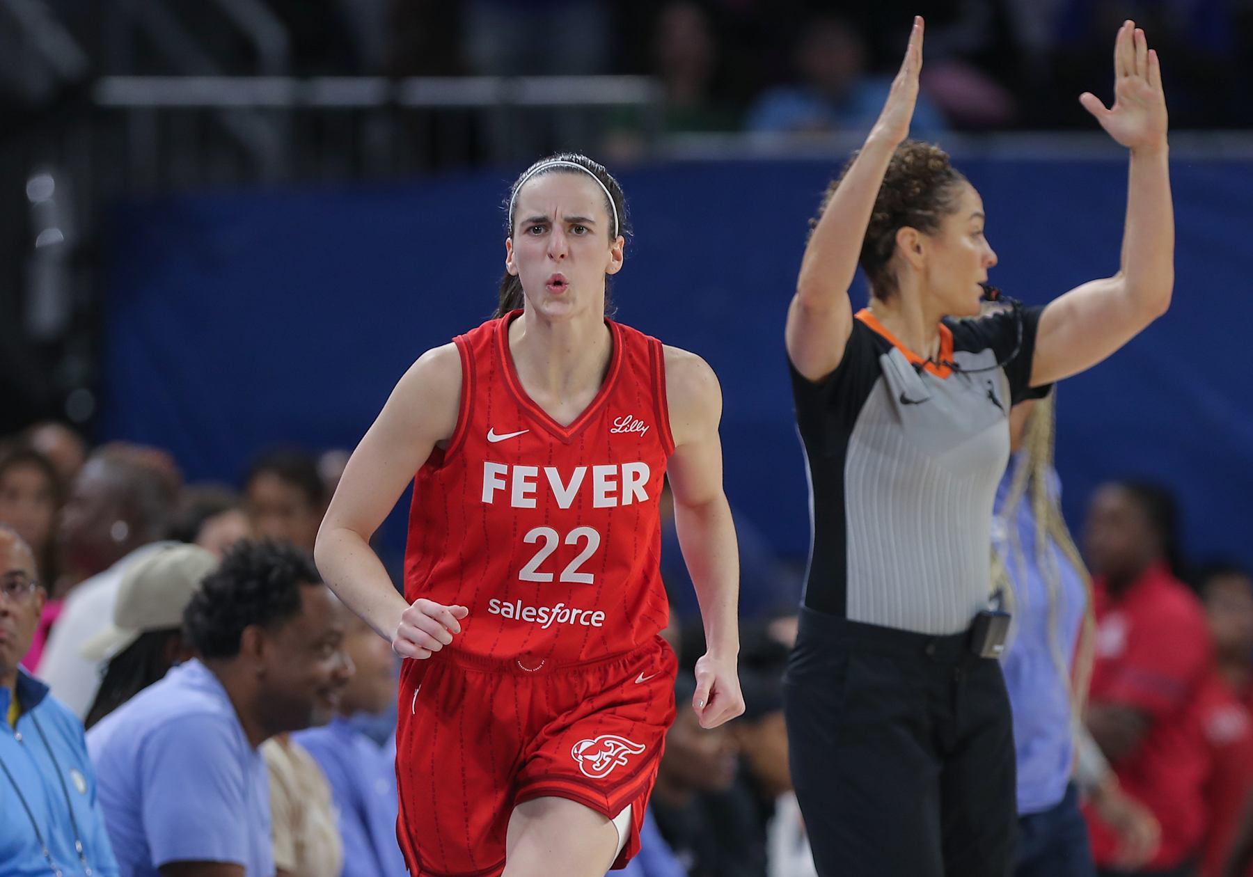 CHICAGO, IL - AUGUST 30: Caitlin Clark #22 of the Indiana Fever reacts after making a 3-point basket during the second half of a WNBA game against the Chicago Sky on August 30, 2024 at Wintrust Arena in Chicago, Illinois. (Photo by Melissa Tamez/Icon Sportswire via Getty Images)
