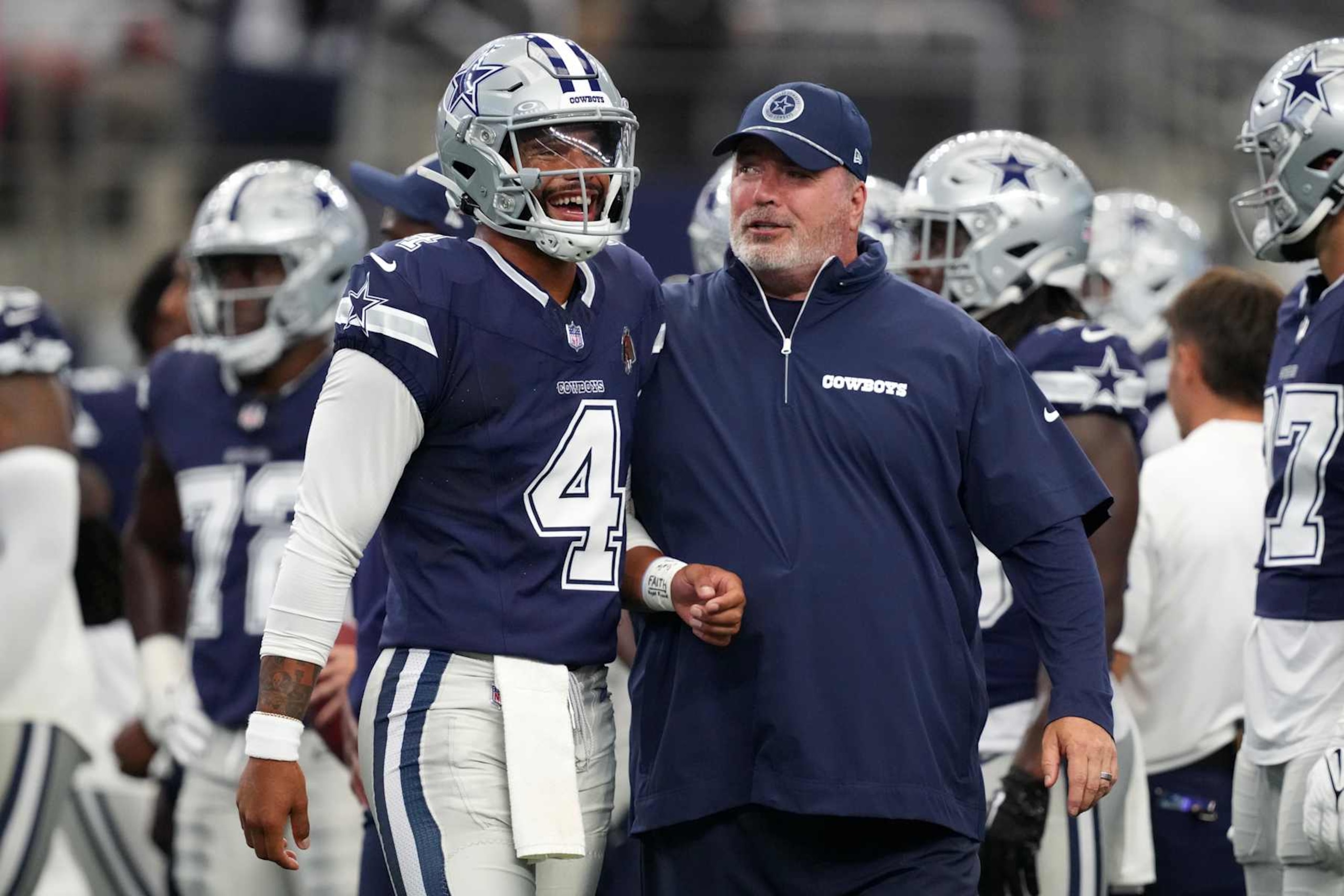 ARLINGTON, TEXAS - AUGUST 24: Dak Prescott #4 of the Dallas Cowboys and head coach Mike McCarthy talk on the field during warmups before a preseason game against the Los Angeles Chargers at AT&T Stadium on August 24, 2024 in Arlington, Texas. (Photo by Sam Hodde/Getty Images) ARLINGTON, TEXAS - AUGUST 24: Dak Prescott #4 of the Dallas Cowboys and head coach Mike McCarthy talk on the field during warmups before a preseason game against the Los Angeles Chargers at AT&T Stadium on August 24, 2024 in Arlington, Texas. (Photo by Sam Hodde/Getty Images)