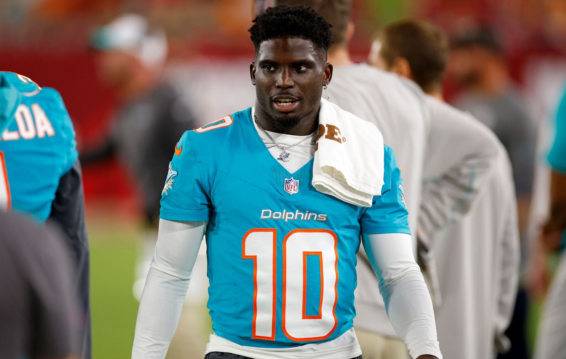 TAMPA, FLORIDA - AUGUST 23: Tyreek Hill #10 of the Miami Dolphins looks on during a preseason game against the Tampa Bay Buccaneers at Raymond James Stadium on August 23, 2024 in Tampa, Florida. (Photo by Mike Ehrmann/Getty Images)