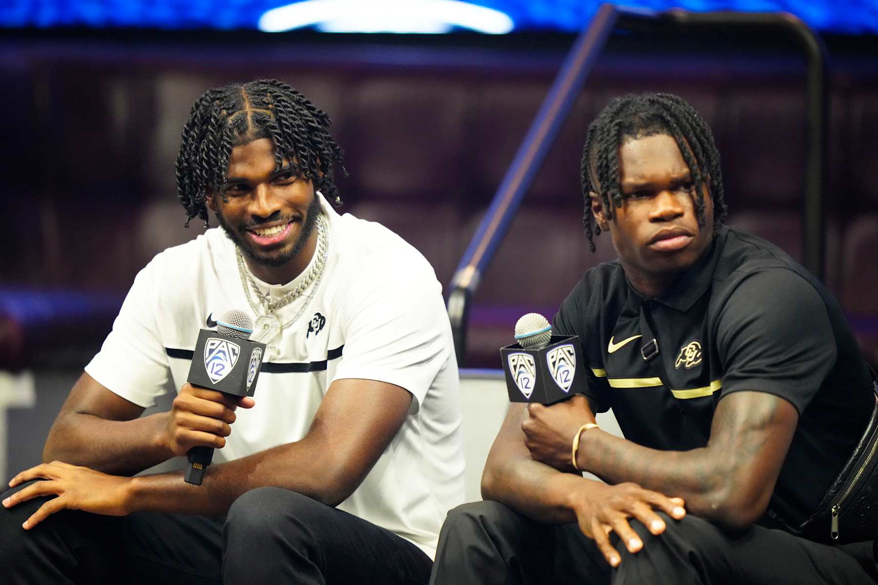 LAS VEGAS, NEVADA - JULY 21: (L-R) Shedeur Sanders #2 and Travis Hunter #12 of the University of Colorado Buffaloes speak with the media at Zouk Nightclub at Resorts World Las Vegas on July 21, 2023 in Las Vegas, Nevada. (Photo by Louis Grasse/Getty Images)