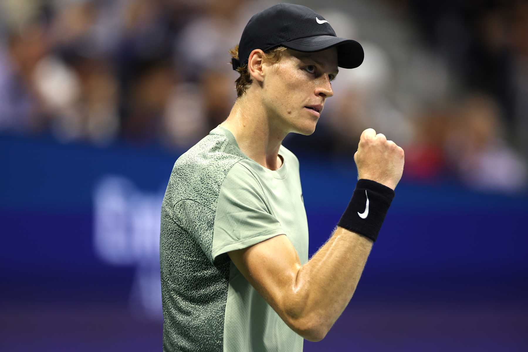 NEW YORK, NEW YORK - SEPTEMBER 02: Jannik Sinner of Italy reacts after winning the first set in a tiebreak against Tommy Paul of the United States during their Men's Singles Fourth Round match on Day Eight of the 2024 US Open at USTA Billie Jean King National Tennis Center on September 02, 2024 in the Flushing neighborhood of the Queens borough of New York City. (Photo by Sarah Stier/Getty Images)