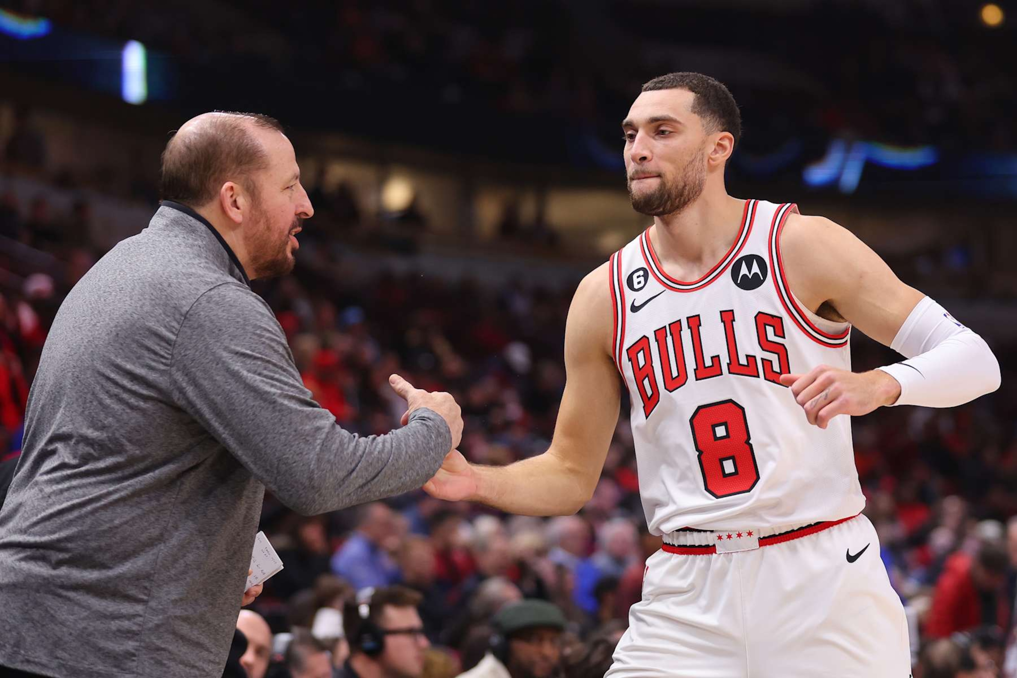 CHICAGO, ILLINOIS - DECEMBER 14: Head coach Tom Thibodeau of the New York Knicks greets Zach LaVine #8 of the Chicago Bulls prior to the game at United Center on December 14, 2022 in Chicago, Illinois. NOTE TO USER: User expressly acknowledges and agrees that, by downloading and or using this photograph, User is consenting to the terms and conditions of the Getty Images License Agreement. (Photo by Michael Reaves/Getty Images) CHICAGO, ILLINOIS - DECEMBER 14: Head coach Tom Thibodeau of the New York Knicks greets Zach LaVine #8 of the Chicago Bulls prior to the game at United Center on December 14, 2022 in Chicago, Illinois. NOTE TO USER: User expressly acknowledges and agrees that, by downloading and or using this photograph, User is consenting to the terms and conditions of the Getty Images License Agreement. (Photo by Michael Reaves/Getty Images)