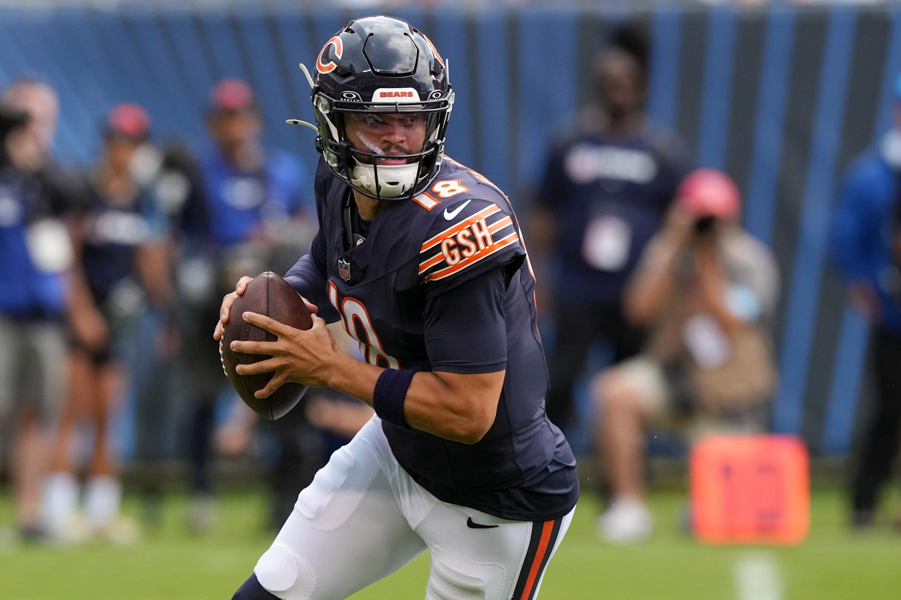 CHICAGO, IN - AUGUST 17: Caleb Williams #18 of the Chicago Bears drops back to pass during the first quarter of an NFL preseason football game against the Cincinnati Bengals, at Soldier Field on August 17, 2024 in Chicago, Illinois. (Photo by Todd Rosenberg/Getty Images)