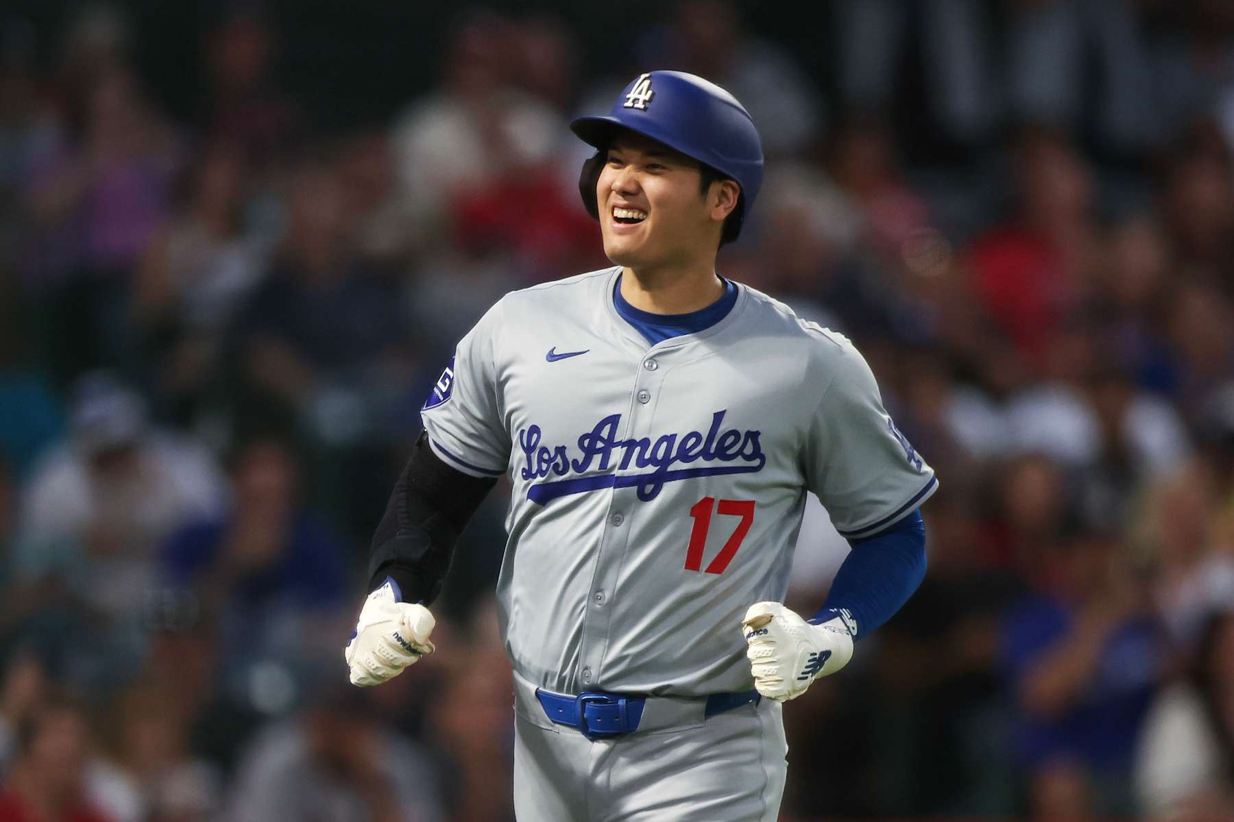 ANAHEIM, CALIFORNIA - SEPTEMBER 03: Shohei Ohtani #17 of the Los Angeles Dodgers reacts to his run in the third inning against the Los Angeles Angels at Angel Stadium of Anaheim on September 03, 2024 in Anaheim, California. (Photo by Meg Oliphant/Getty Images)