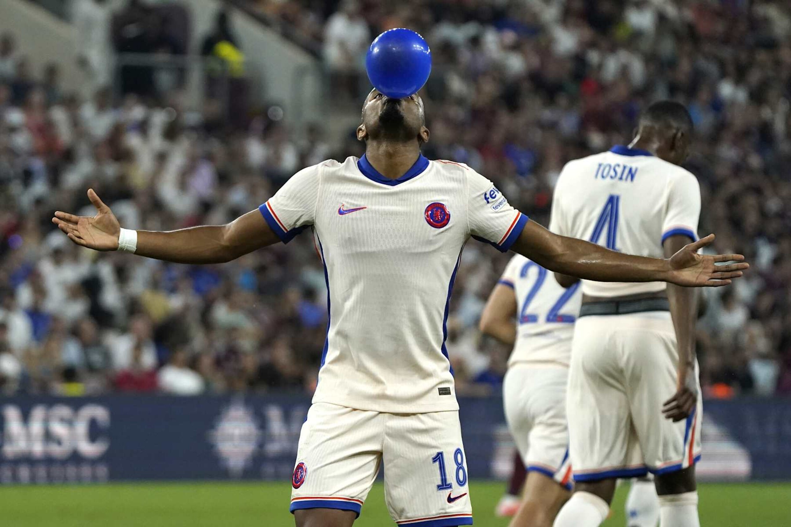 GENEVA, SWITZERLAND - AUGUST 29:  Christopher Nkunku of Chelsea celebrates his first goal on penalty in the match between Servette FC and Chelsea FC of UEFA Europa Conference League Play-Offs Second Leg at Stade de Geneve on August 29, 2024 in Geneva, Switzerland. (Photo by Pier Marco Tacca/Getty Images)