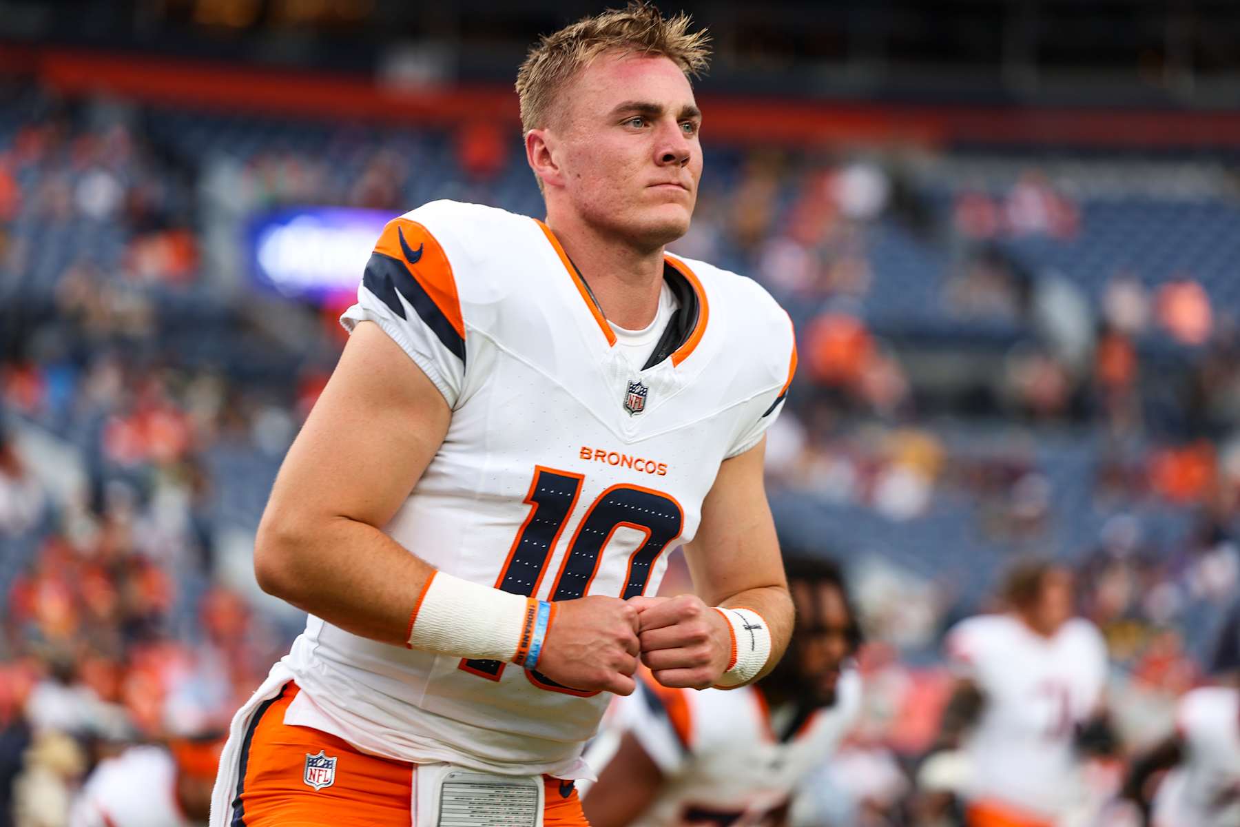 DENVER, CO - AUGUST 18: Bo Nix #10 of the Denver Broncos warms up prior to an NFL football game against the Green Bay Packers at Empower Field at Mile High on August 18, 2024 in Denver, CO. (Photo by Perry Knotts/Getty Images)