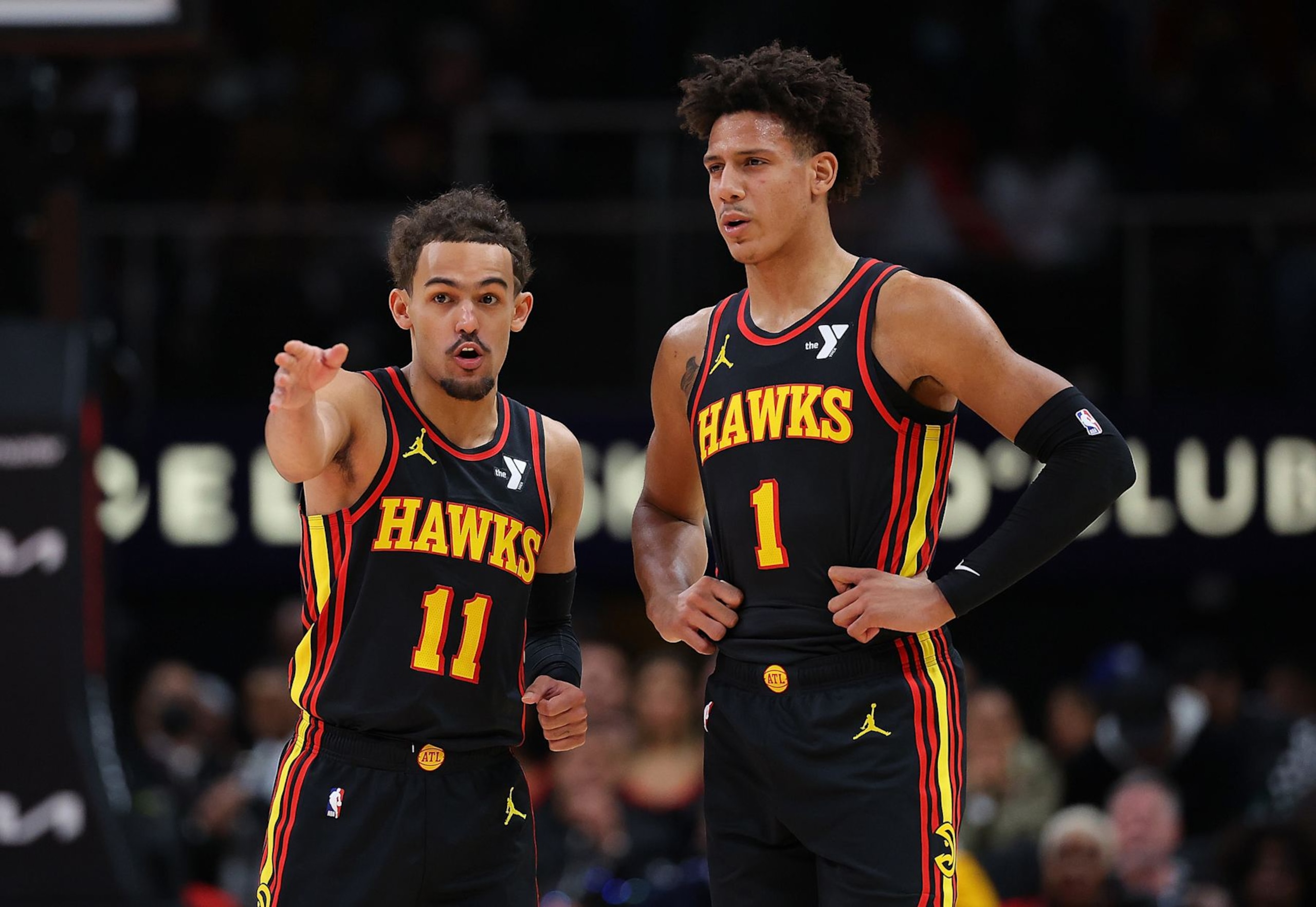 ATLANTA, GEORGIA - FEBRUARY 05: Trae Young #11 and Jalen Johnson #1 of the Atlanta Hawks converse against the LA Clippers during the second quarter at State Farm Arena on February 05, 2024 in Atlanta, Georgia. NOTE TO USER: User expressly acknowledges and agrees that, by downloading and/or using this photograph, user is consenting to the terms and conditions of the Getty Images License Agreement. (Photo by Kevin C. Cox/Getty Images) ATLANTA, GEORGIA - FEBRUARY 05: Trae Young #11 and Jalen Johnson #1 of the Atlanta Hawks converse against the LA Clippers during the second quarter at State Farm Arena on February 05, 2024 in Atlanta, Georgia. NOTE TO USER: User expressly acknowledges and agrees that, by downloading and/or using this photograph, user is consenting to the terms and conditions of the Getty Images License Agreement. (Photo by Kevin C. Cox/Getty Images)