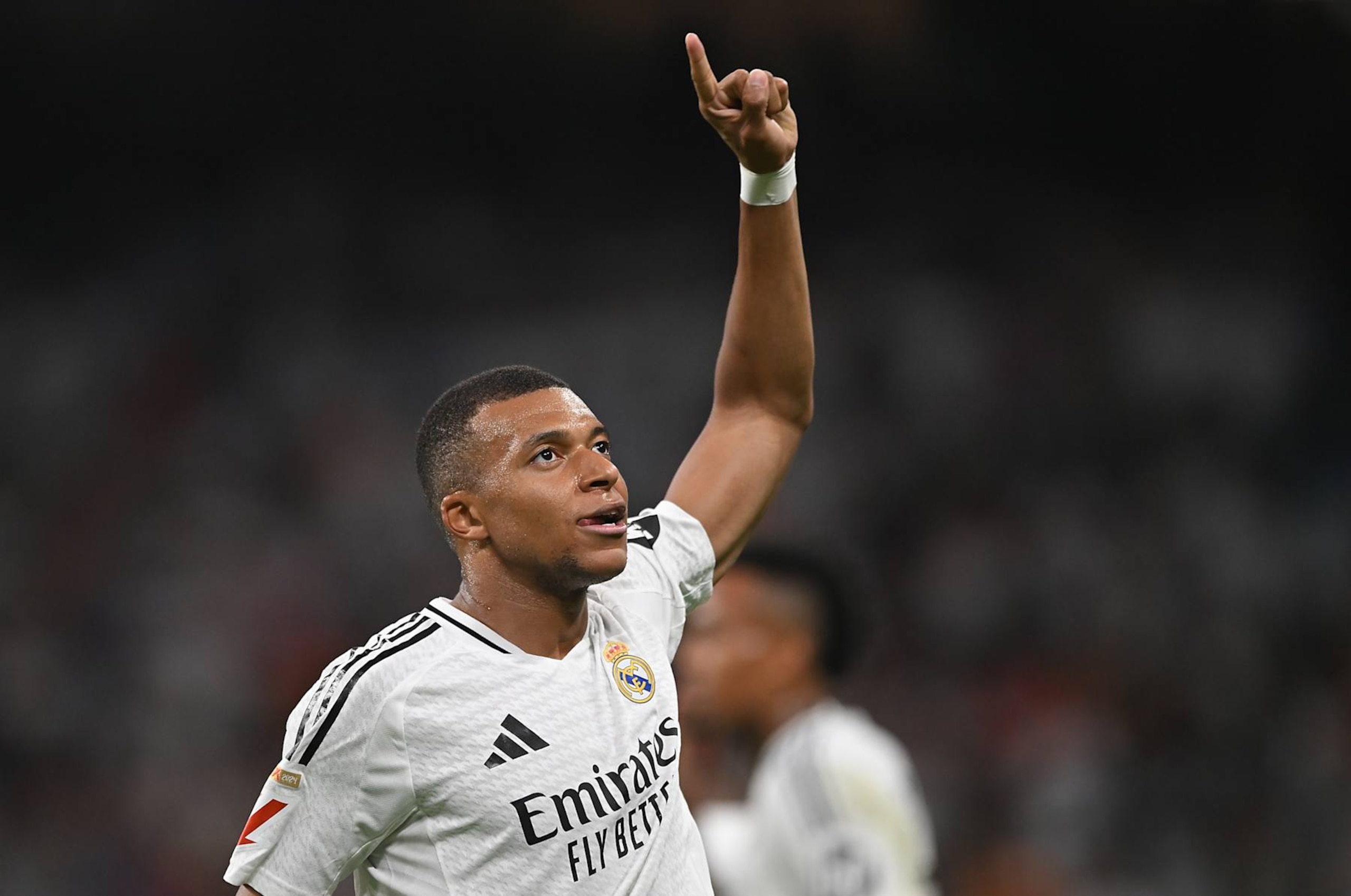 MADRID, SPAIN - SEPTEMBER 01: Kylian Mbappe of Real Madrid celebrates after scoring his team's first goal during the LaLiga match between Real Madrid CF and Real Betis Balompie at Estadio Santiago Bernabeu on September 01, 2024 in Madrid, Spain. (Photo by Denis Doyle/Getty Images) MADRID, SPAIN - SEPTEMBER 01: Kylian Mbappe of Real Madrid celebrates after scoring his team's first goal during the LaLiga match between Real Madrid CF and Real Betis Balompie at Estadio Santiago Bernabeu on September 01, 2024 in Madrid, Spain. (Photo by Denis Doyle/Getty Images)