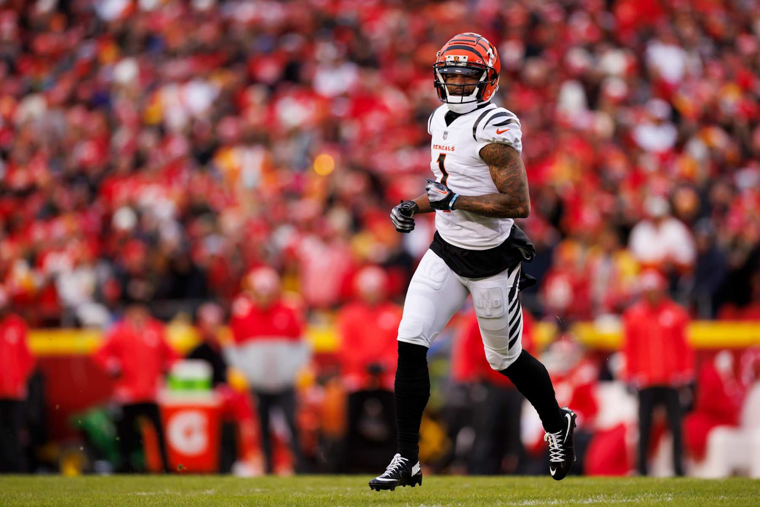 KANSAS CITY, MISSOURI - DECEMBER 31: Ja'Marr Chase #1 of the Cincinnati Bengals lines up to run a route during an NFL football game against the Kansas City Chiefs at GEHA Field at Arrowhead Stadium on December 31, 2023 in Kansas City, Missouri. (Photo by Ryan Kang/Getty Images)