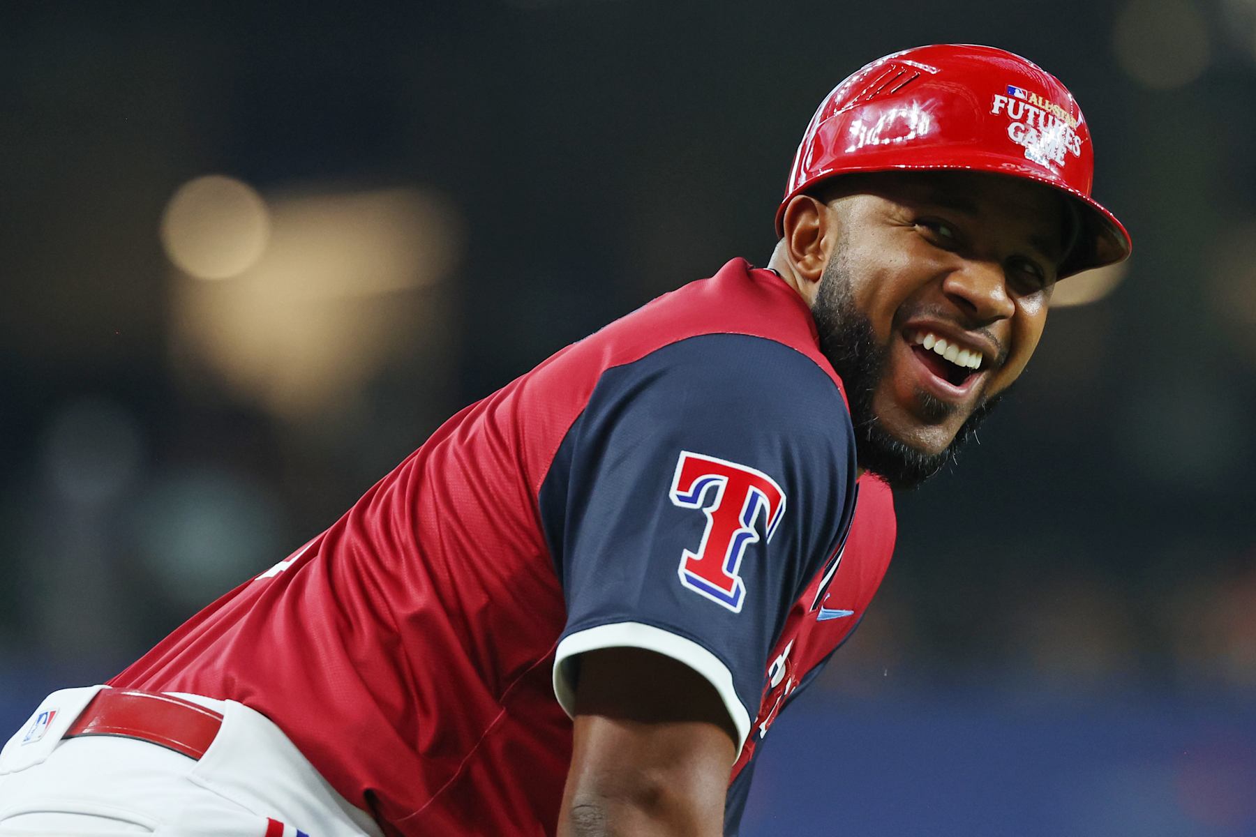 ARLINGTON, TEXAS - JULY 13: Third base coach Elvis Andrus of the American League reacts during the sixth inning of the All-Star Futures Game at Globe Life Field on July 13, 2024 in Arlington, Texas.  (Photo by Richard Rodriguez/Getty Images)