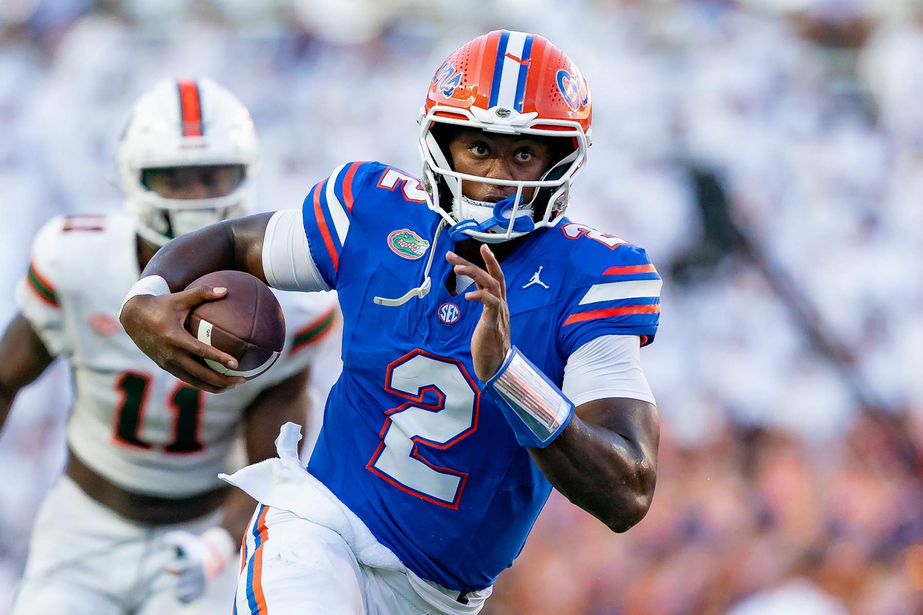 GAINESVILLE, FL - AUGUST 31: Florida Gators quarterback DJ Lagway (2) scramblesduring a college football game between the Miami Hurricanes and the Florida Gators on August 17, 2024 at Ben Hill Griffin Stadium in Gainesville, FL. (Photo by Chris Leduc/Icon Sportswire via Getty Images)