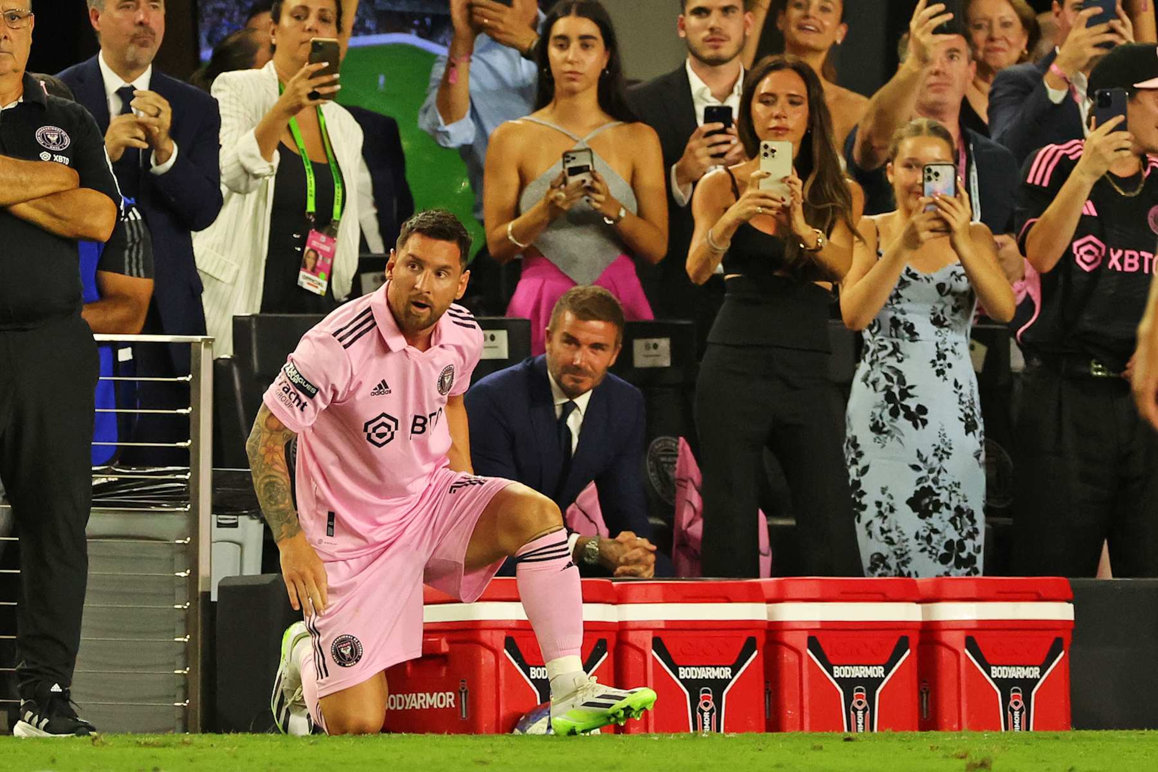 FORT LAUDERDALE, FLORIDA - JULY 21: Lionel Messi #10 of Inter Miami CF and co-owner David Beckham look on as fans take photos during the second half of the Leagues Cup 2023 match between Cruz Azul and Inter Miami CF at DRV PNK Stadium on July 21, 2023 in Fort Lauderdale, Florida. (Photo by Stacy Revere/Getty Images) FORT LAUDERDALE, FLORIDA - JULY 21: Lionel Messi #10 of Inter Miami CF and co-owner David Beckham look on as fans take photos during the second half of the Leagues Cup 2023 match between Cruz Azul and Inter Miami CF at DRV PNK Stadium on July 21, 2023 in Fort Lauderdale, Florida. (Photo by Stacy Revere/Getty Images)