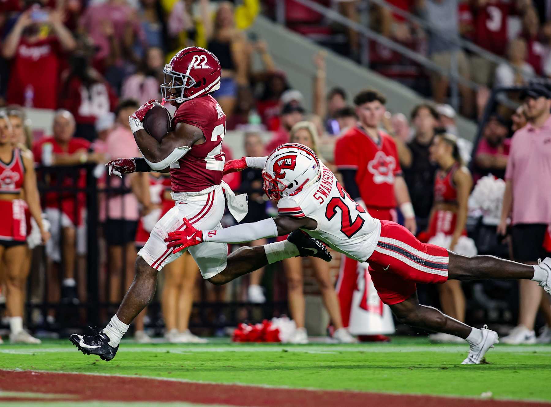 TUSCALOOSA, ALABAMA - AUGUST 31: Justice Haynes #22 of the Alabama Crimson Tide goes in for a first half touchdown against the Western Kentucky Hilltoppers at Bryant-Denny Stadium on August 31, 2024 in Tuscaloosa, Alabama. (Photo by Brandon Sumrall/Getty Images)