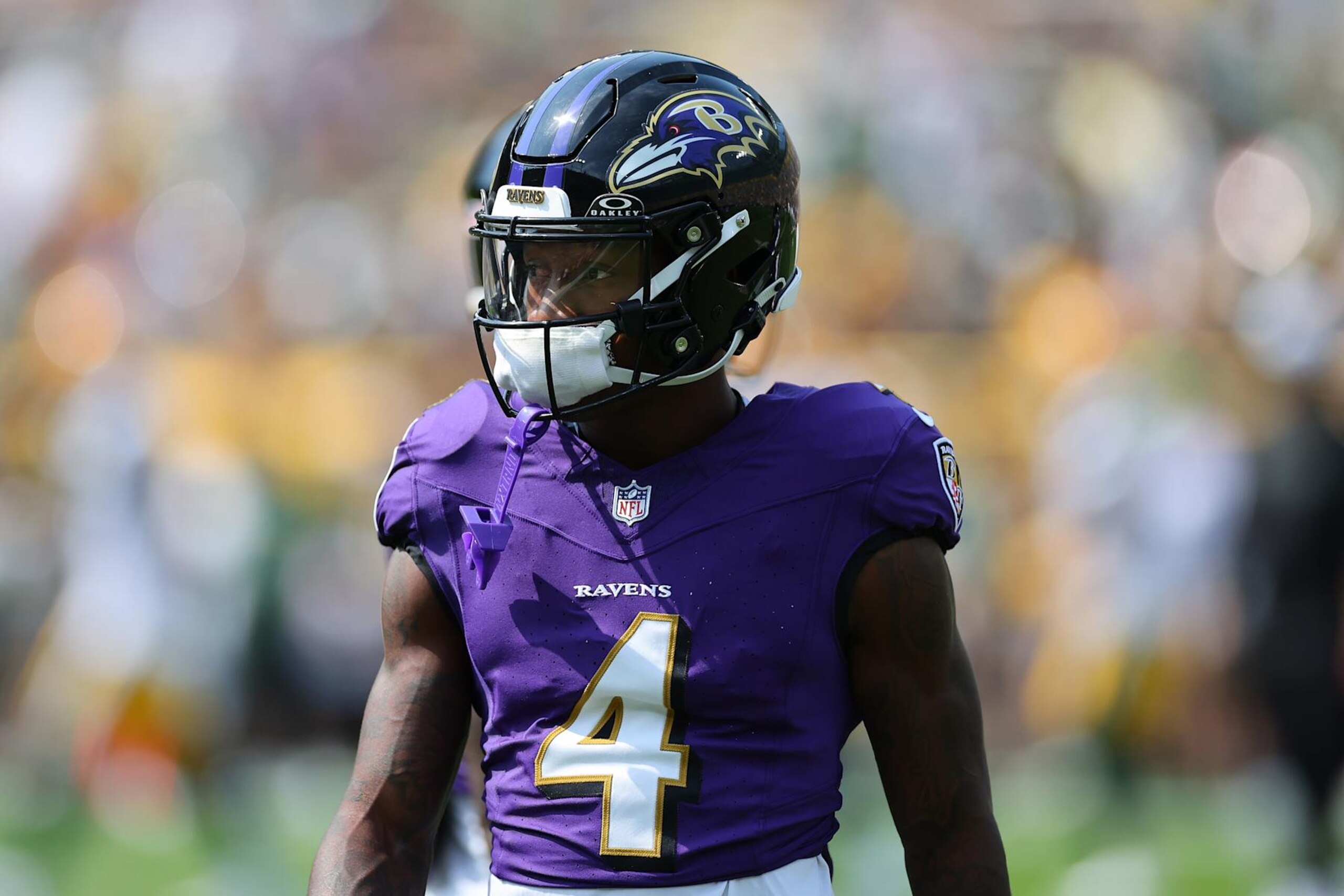 GREEN BAY, WISCONSIN - AUGUST 24: Zay Flowers #4 of the Baltimore Ravens participates in warmups prior to a preseason game against the Green Bay Packers at Lambeau Field on August 24, 2024 in Green Bay, Wisconsin.  (Photo by Stacy Revere/Getty Images)