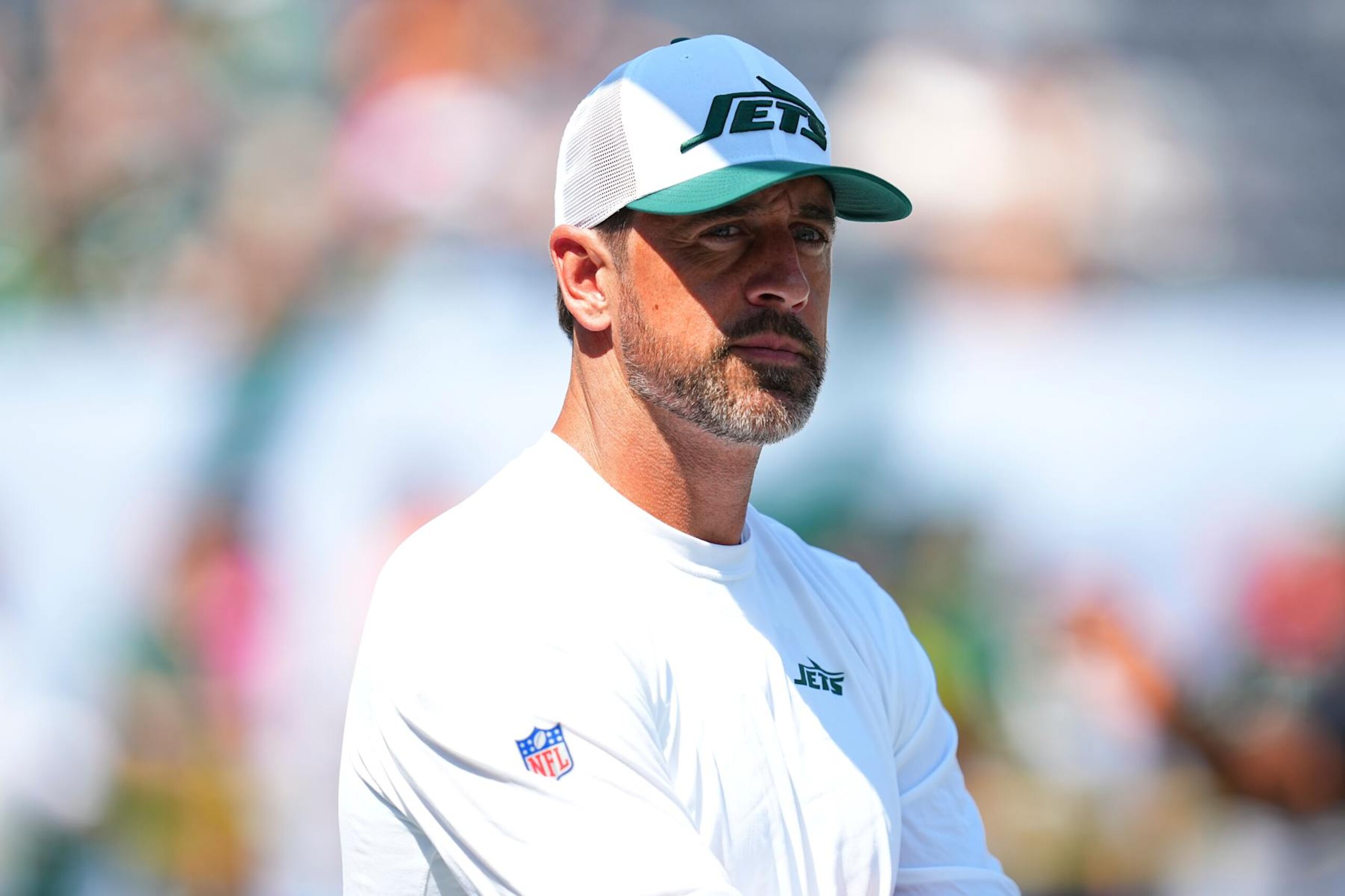 EAST RUTHERFORD, NEW JERSEY - AUGUST 10: Aaron Rodgers #8 of the New York Jets looks on prior to the preseason game against the Washington Commanders at MetLife Stadium on August 10, 2024 in East Rutherford, New Jersey. (Photo by Mitchell Leff/Getty Images)