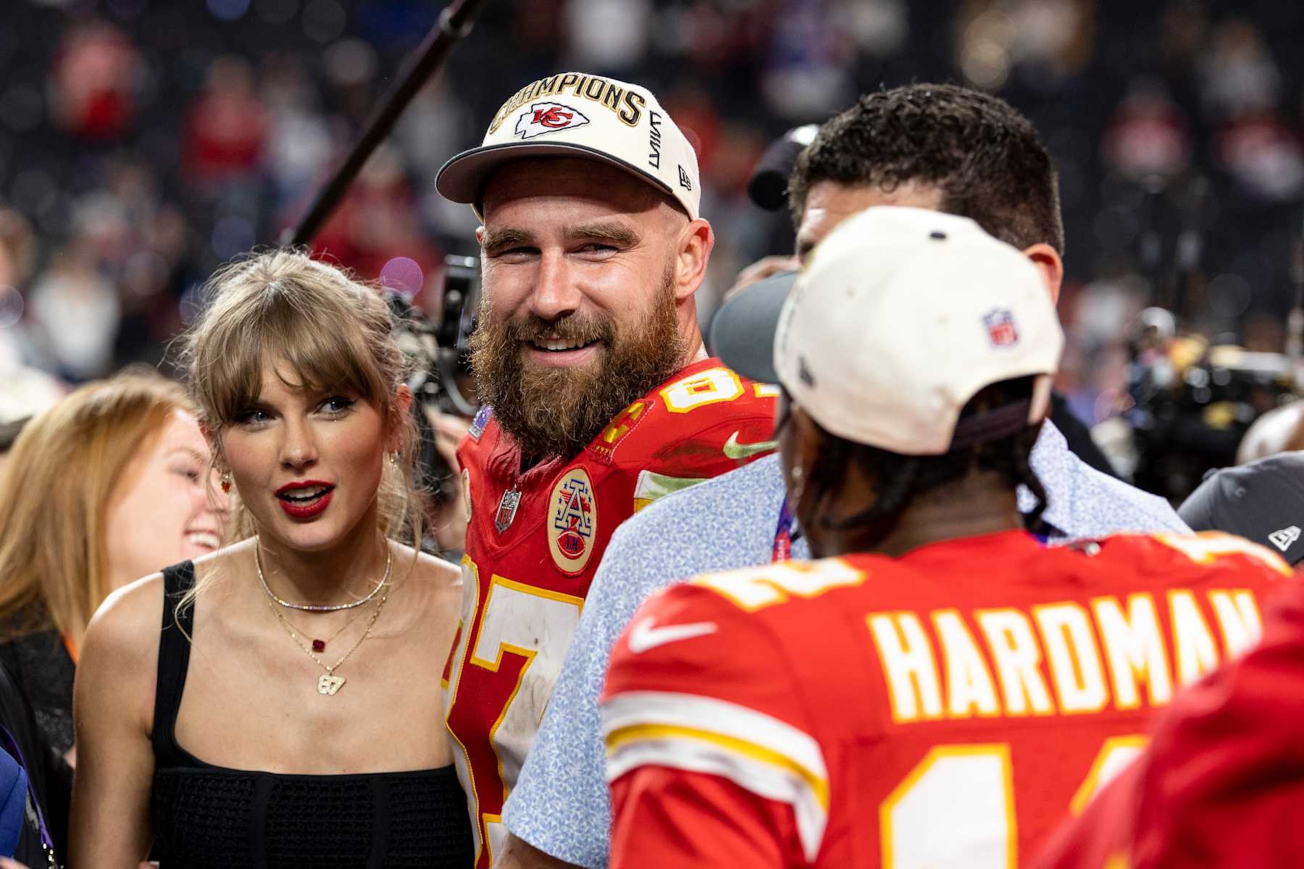 LAS VEGAS, NEVADA - FEBRUARY 11: Travis Kelce #87 of the Kansas City Chiefs and Taylor Swift react as they see Mecole Hardman Jr. #12 of the Kansas City Chiefs following the NFL Super Bowl 58 football game between the San Francisco 49ers and the Kansas City Chiefs at Allegiant Stadium on February 11, 2024 in Las Vegas, Nevada. (Photo by Michael Owens/Getty Images) LAS VEGAS, NEVADA - FEBRUARY 11: Travis Kelce #87 of the Kansas City Chiefs and Taylor Swift react as they see Mecole Hardman Jr. #12 of the Kansas City Chiefs following the NFL Super Bowl 58 football game between the San Francisco 49ers and the Kansas City Chiefs at Allegiant Stadium on February 11, 2024 in Las Vegas, Nevada. (Photo by Michael Owens/Getty Images)
