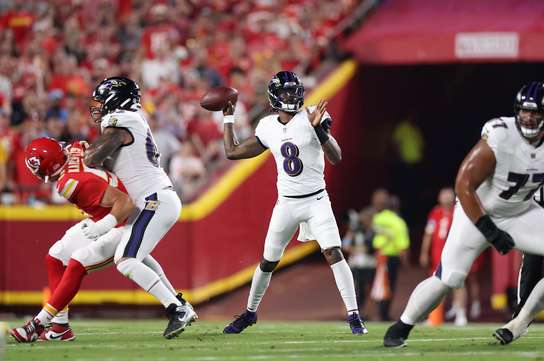 KANSAS CITY, MISSOURI - SEPTEMBER 05: Quarterback Lamar Jackson of the Baltimore Ravens looks to pass against the Kansas City Chiefs during the first quarter at GEHA Field at Arrowhead Stadium on September 05, 2024 in Kansas City, Missouri. (Photo by Christian Petersen/Getty Images)