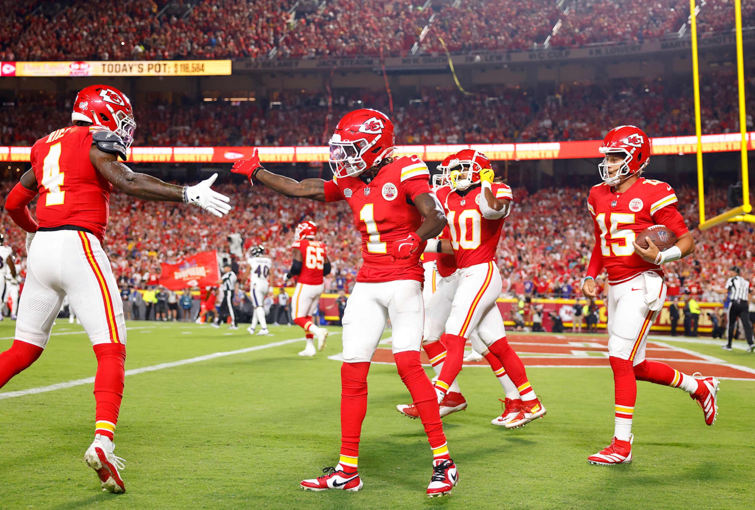 KANSAS CITY, MISSOURI - SEPTEMBER 05: Xavier Worthy #1 of the Kansas City Chiefs celebrates his touchdown with teammate Rashee Rice #4 as they play against the Baltimore Ravens during the first quarter at GEHA Field at Arrowhead Stadium on September 05, 2024 in Kansas City, Missouri. (Photo by David Eulitt/Getty Images)