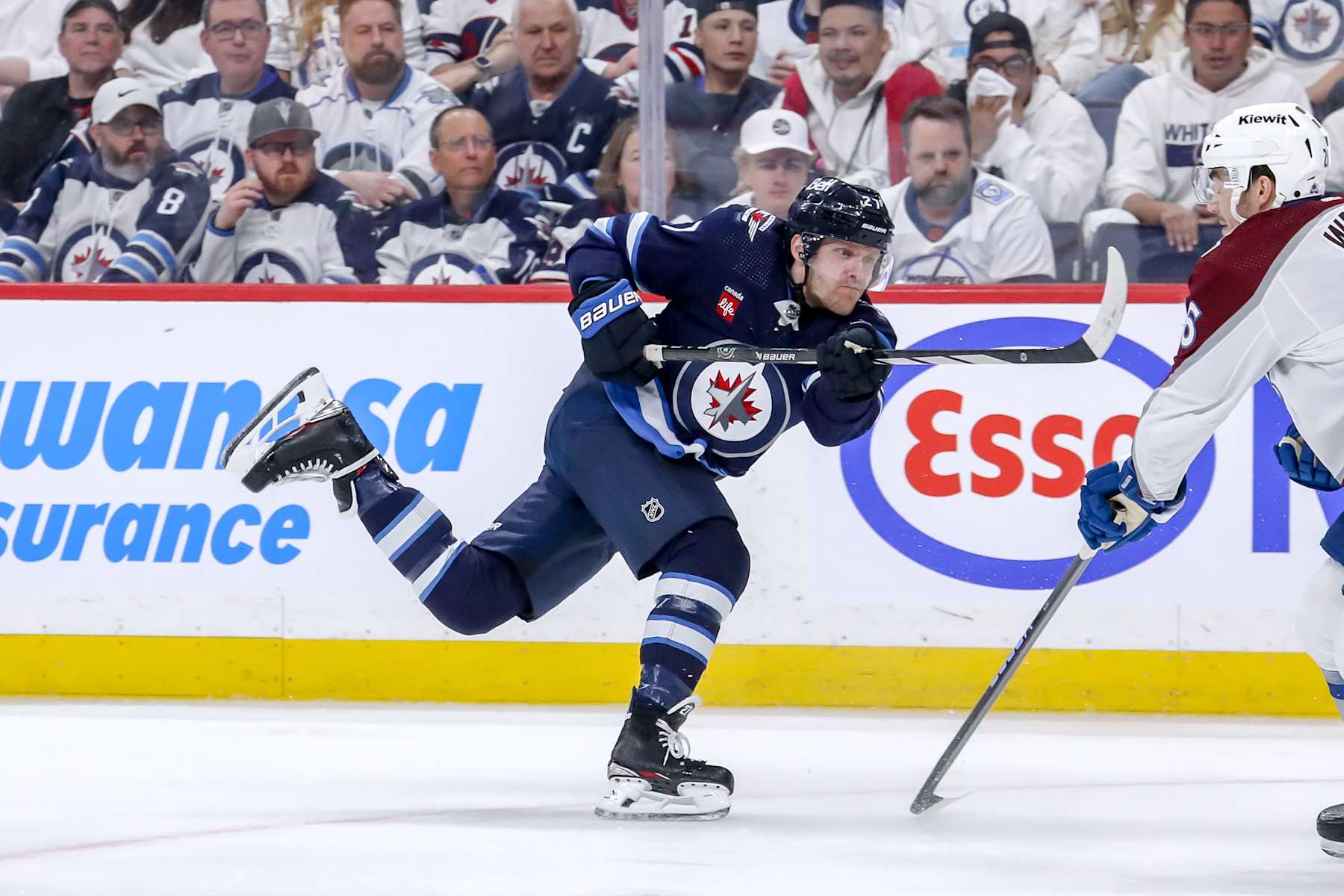 WINNIPEG, CANADA - APRIL 30: Nikolaj Ehlers #27 of the Winnipeg Jets gets takes a shot on goal during third period action against the Colorado Avalanche in Game Five of the First Round of the 2024 Stanley Cup Playoffs at the Canada Life Centre on April 30, 2024 in Winnipeg, Manitoba, Canada. The Avs defeated the Jets 6-3 and win the series 4-1. (Photo by Darcy Finley/NHLI via Getty Images)