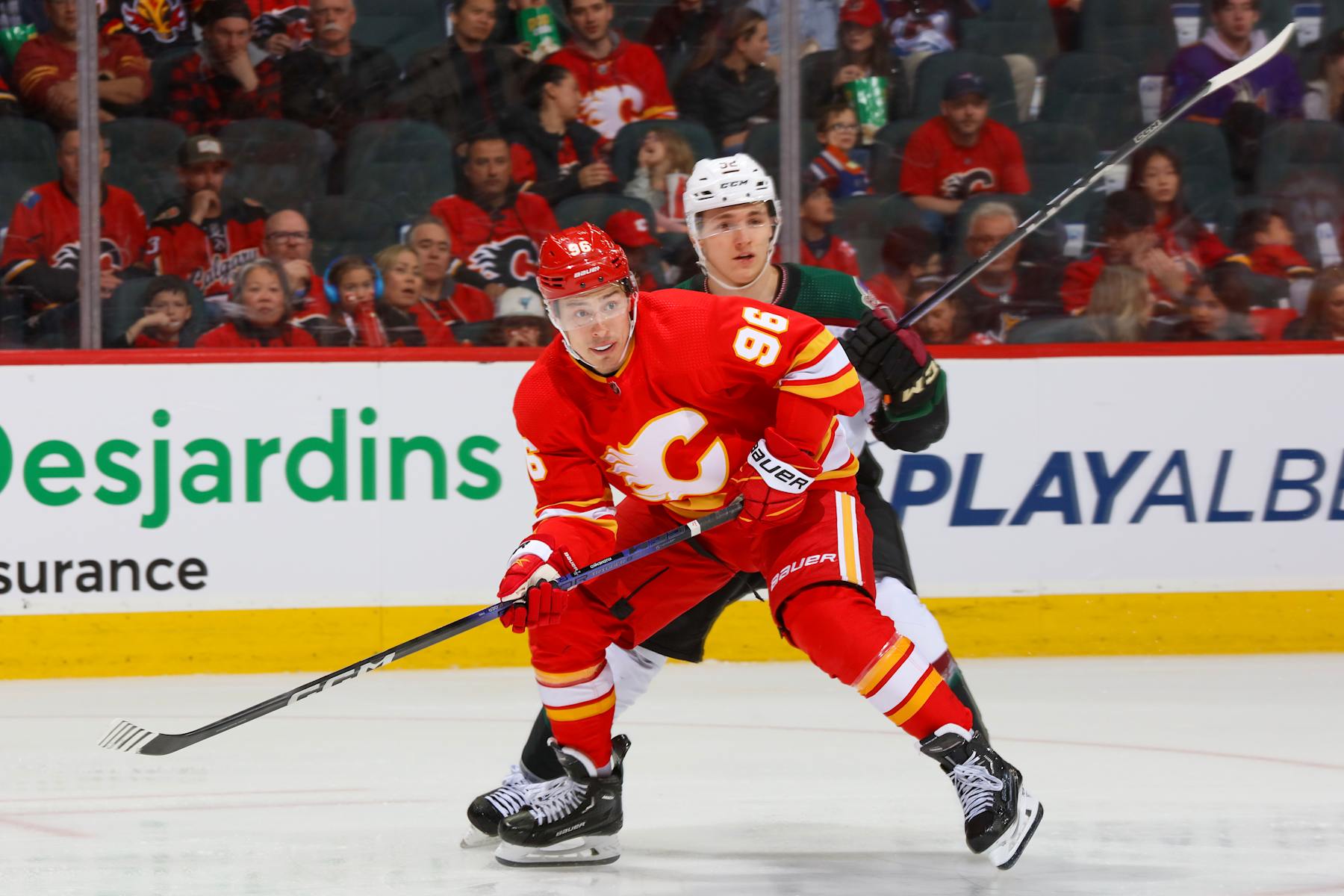 CALGARY, ALBERTA - APRIL 14: Andrei Kuzmenko #9 of the Calgary Flames skates against the Arizona Coyotes at the Scotiabank Saddledome on April 14, 2024 in Calgary, Alberta. (Photo by Gerry Thomas/NHLI via Getty Images)