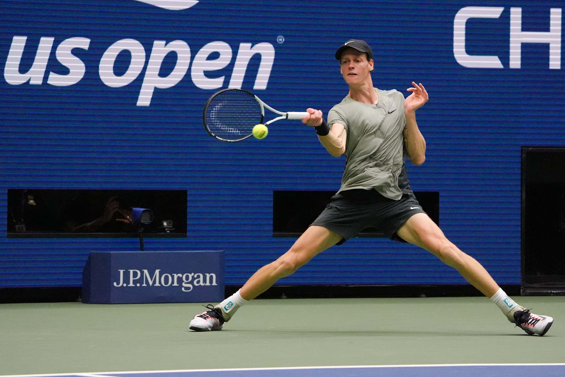 Italy's Jannik Sinner hits a return to Britain's Jack Draper during their men's semifinals match on day twelve of the US Open tennis tournament at the USTA Billie Jean King National Tennis Center in New York City, on September 6, 2024. (Photo by TIMOTHY A. CLARY / AFP) (Photo by TIMOTHY A. CLARY/AFP via Getty Images)