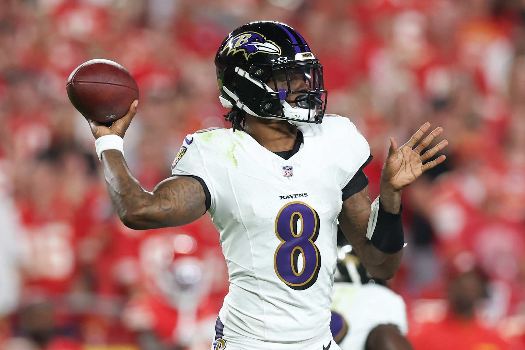 KANSAS CITY, MO - SEPTEMBER 05: Baltimore Ravens quarterback Lamar Jackson (8) passes in the first quarter of an NFL game between the Baltimore Ravens and Kansas City Chiefs on September 5, 2024 at GEHA Field at Arrowhead Stadium in Kansas City, MO. (Photo by Scott Winters/Icon Sportswire via Getty Images)