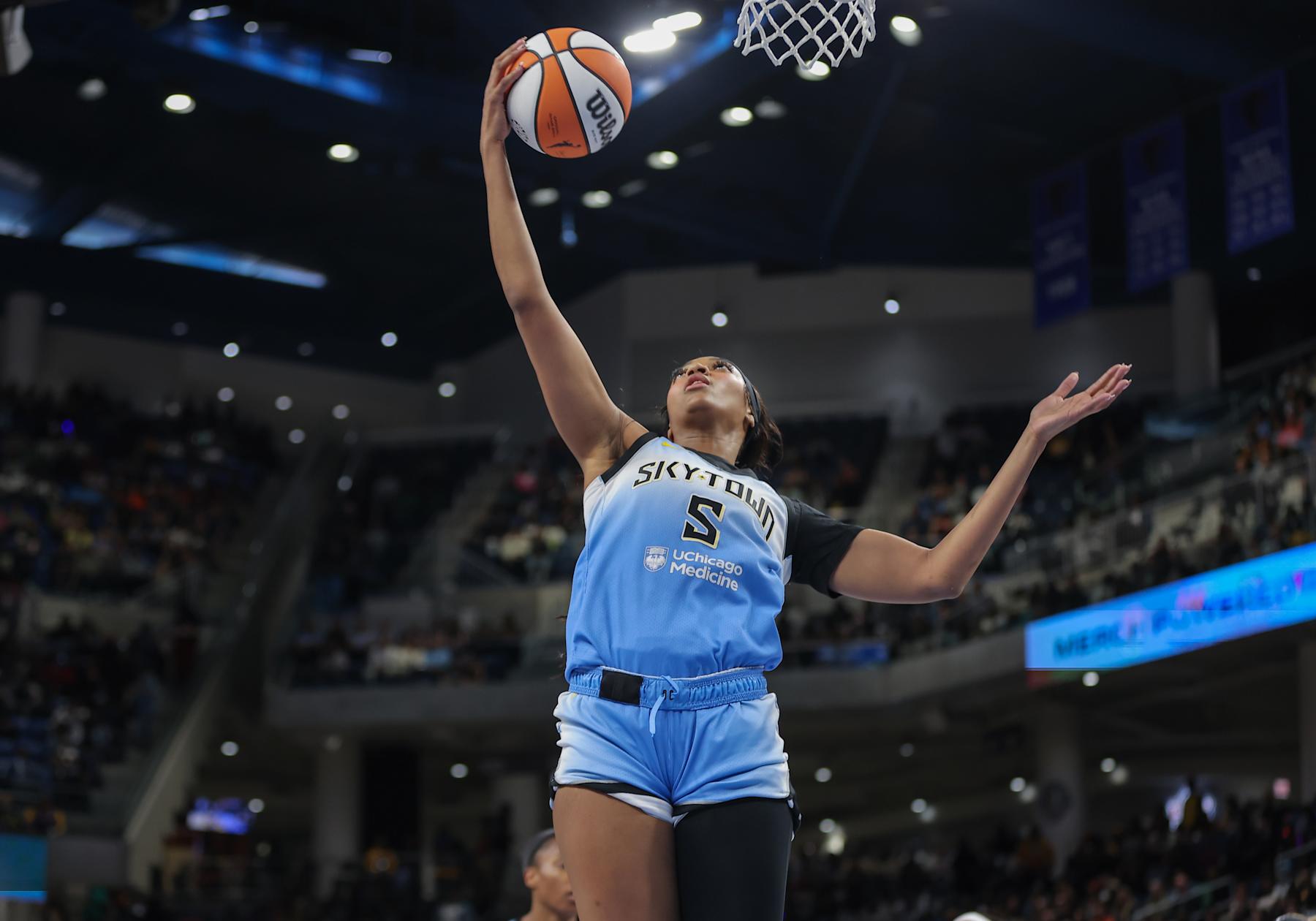 CHICAGO, IL - SEPTEMBER 06: Angel Reese #5 of the Chicago Sky grabs the rebound during the first half of a WNBA game against the Los Angeles Sparks on September 6, 2024 at Wintrust Arena in Chicago, Illinois. (Photo by Melissa Tamez/Icon Sportswire via Getty Images)