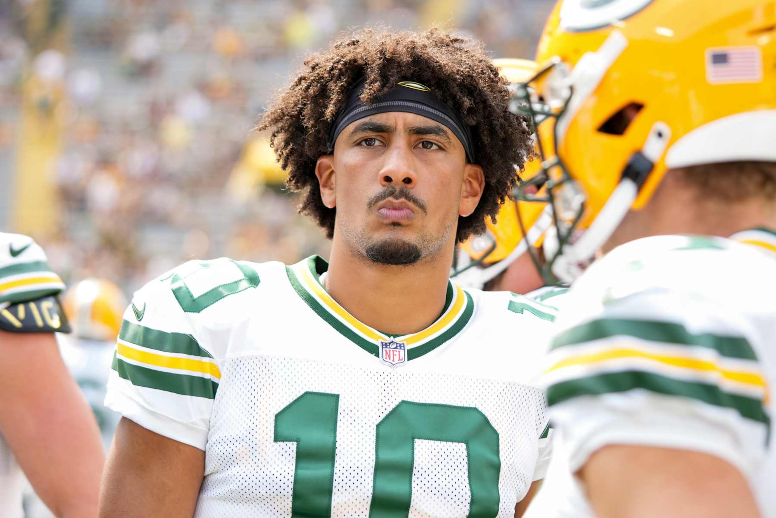 GREEN BAY, WISCONSIN - AUGUST 24: Quarterback Jordan Love #10 of the Green Bay Packers stands on the field prior to an NFL preseason football game against the Baltimore Ravens, at Lambeau Field on August 24, 2024 in Green Bay, Wisconsin. (Photo by Todd Rosenberg/Getty Images)