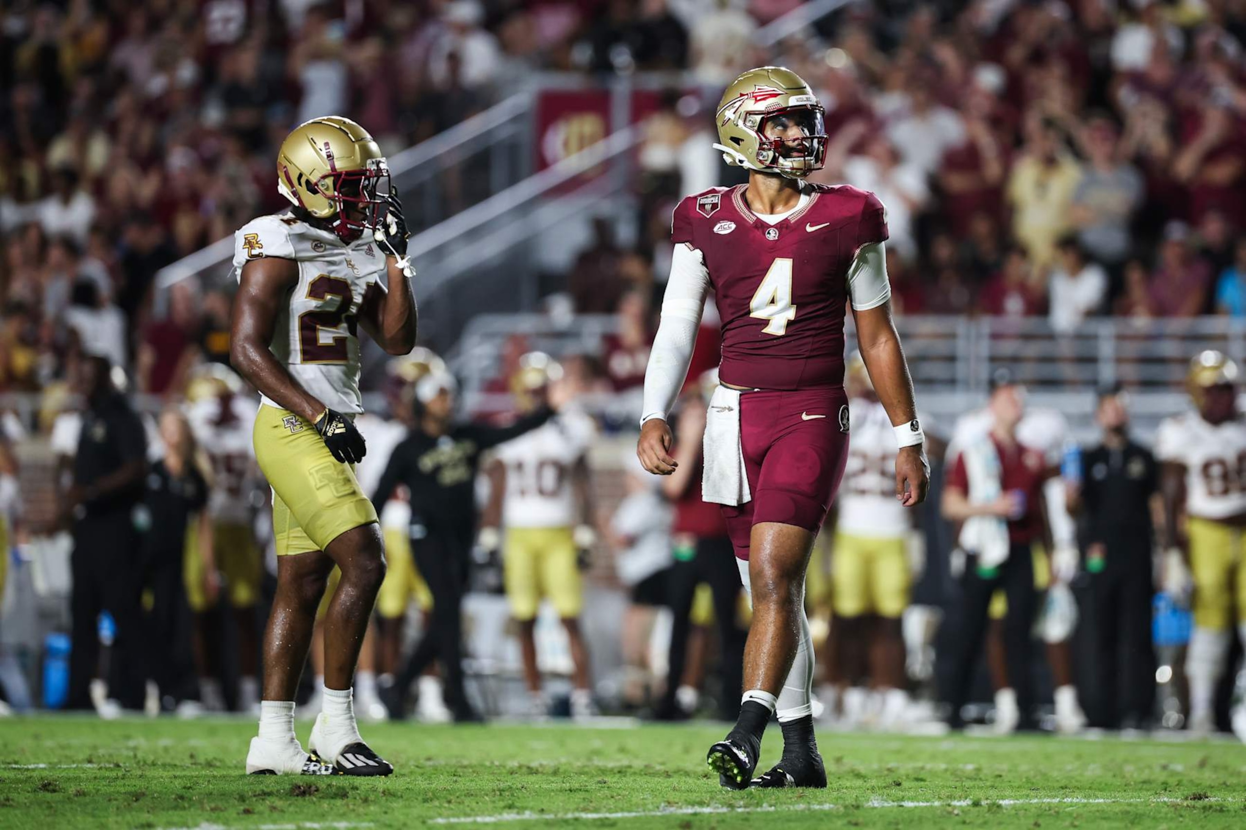 TALLAHASSEE, FLORIDA - SEPTEMBER 02: DJ Uiagalelei #4 of the Florida State Seminoles looks on during the first half of a game against the Boston College Eagles at Doak Campbell Stadium on September 02, 2024 in Tallahassee, Florida. (Photo by James Gilbert/Getty Images)