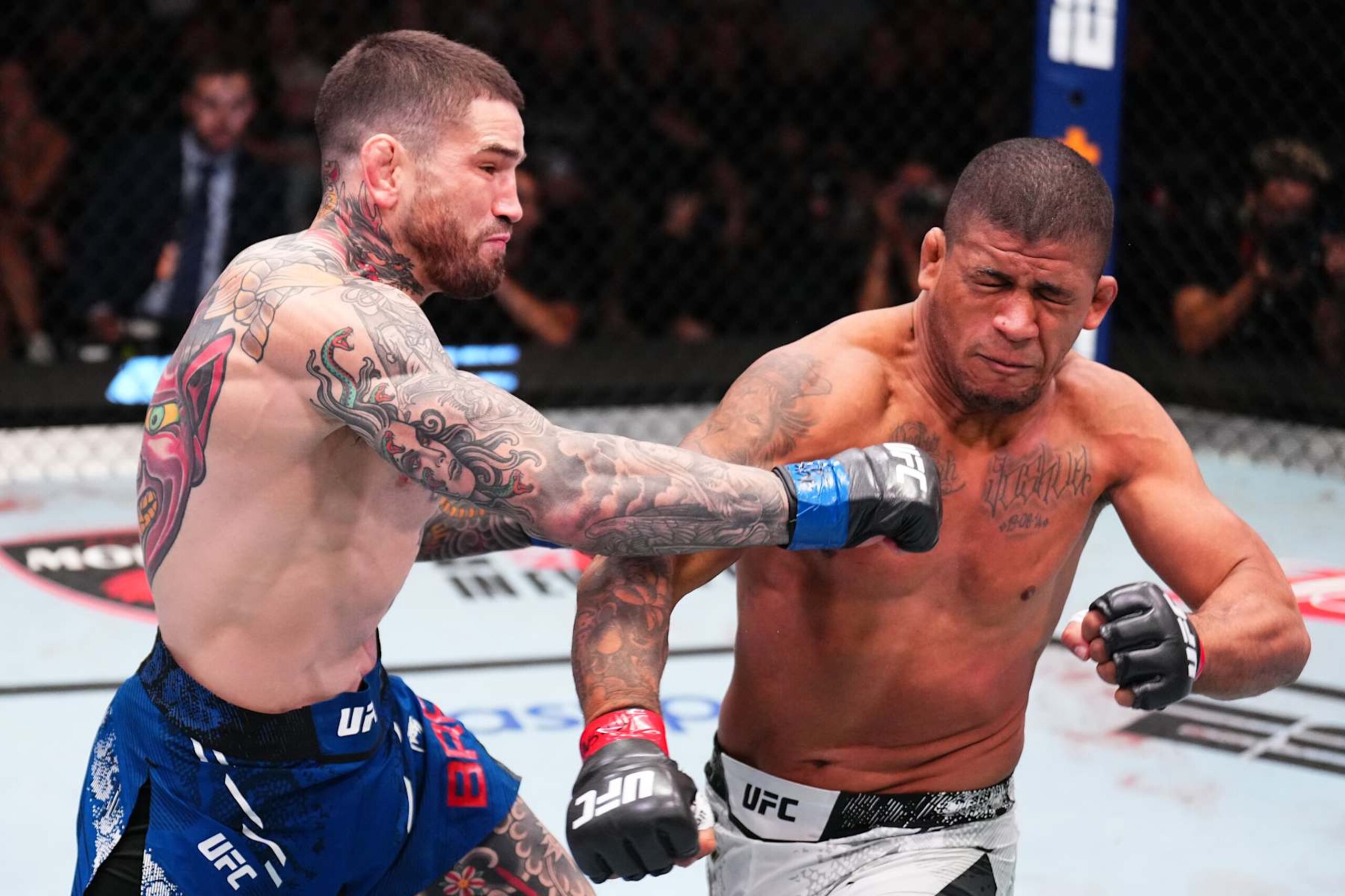 LAS VEGAS, NEVADA - SEPTEMBER 07: (L-R) Sean Brady punches Gilbert Burns of Brazil in a welterweight fight during the UFC Fight Night event at UFC APEX on September 07, 2024 in Las Vegas, Nevada. (Photo by Chris Unger/Zuffa LLC via Getty Images)