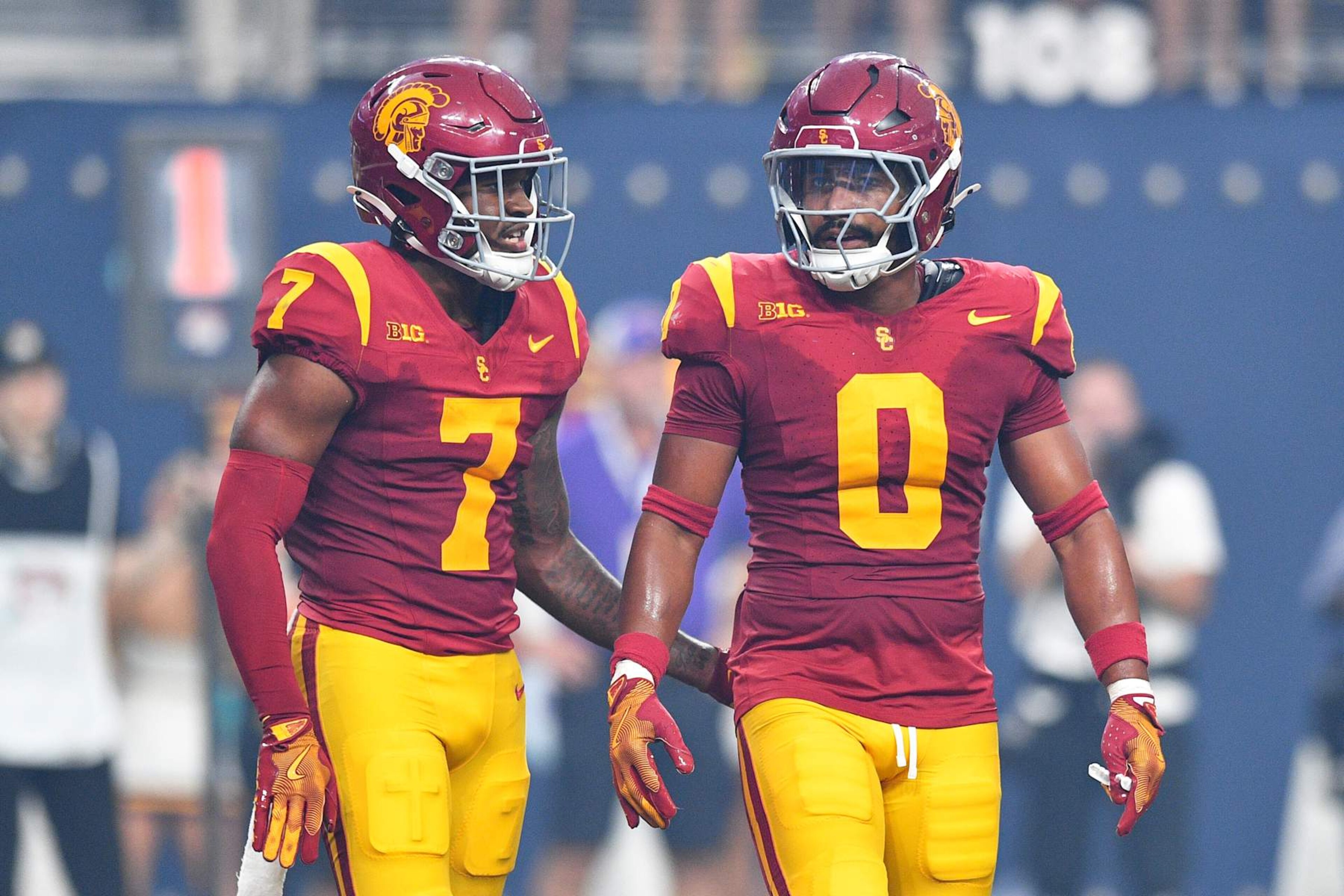LAS VEGAS, NV - SEPTEMBER 01: USC Trojans safety Kamari Ramsey (7) looks on with USC Trojans safety Akili Arnold (0) during the Modelo Vegas Kickoff Classic game between the LSU Tigers and the USC Trojans on September 1, 2024 at Allegiant Stadium in Las Vegas, Nevada. (Photo by Brian Rothmuller/Icon Sportswire via Getty Images) LAS VEGAS, NV - SEPTEMBER 01: USC Trojans safety Kamari Ramsey (7) looks on with USC Trojans safety Akili Arnold (0) during the Modelo Vegas Kickoff Classic game between the LSU Tigers and the USC Trojans on September 1, 2024 at Allegiant Stadium in Las Vegas, Nevada. (Photo by Brian Rothmuller/Icon Sportswire via Getty Images)