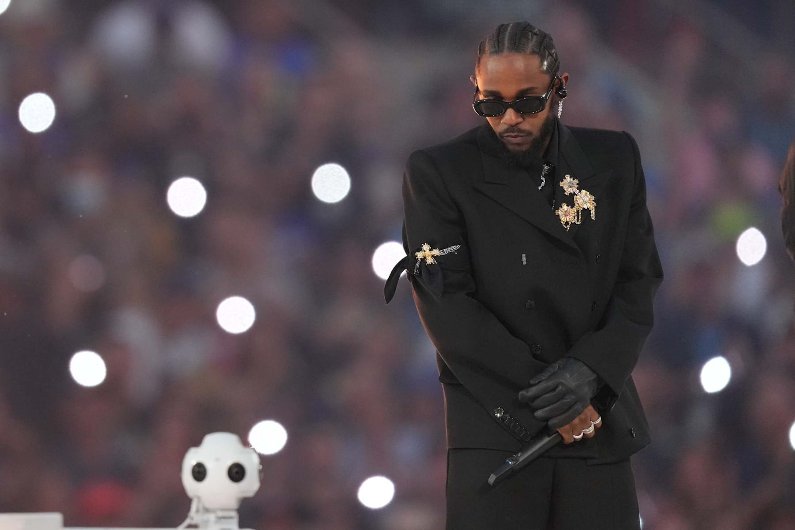 INGLEWOOD, CALIFORNIA - FEBRUARY 13: Kendrick Lamar performs in the Pepsi Halftime Show during the NFL Super Bowl LVI football game between the Cincinnati Bengals and the Los Angeles Rams at SoFi Stadium on February 13, 2022 in Inglewood, California. (Photo by Cooper Neill/Getty Images)