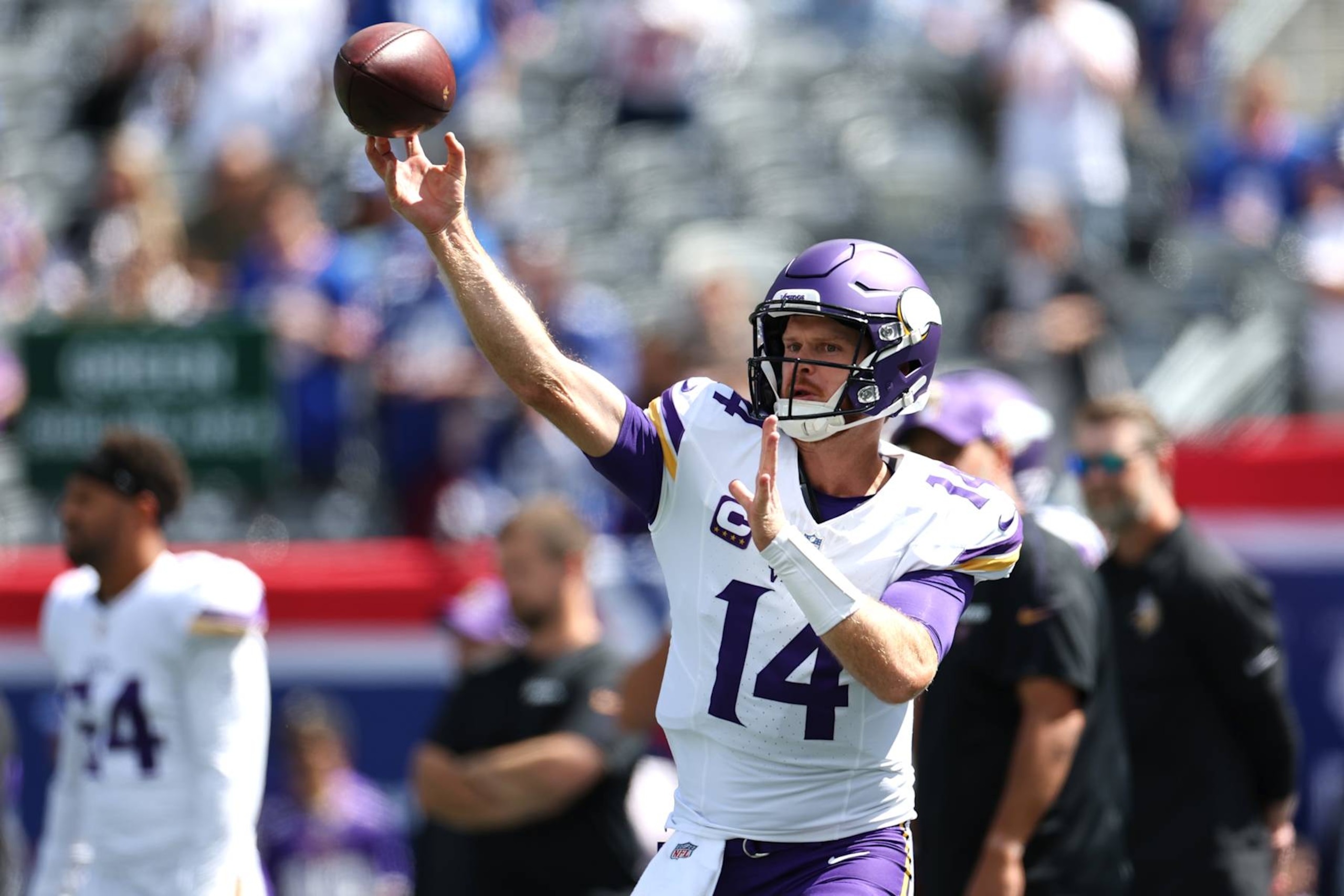 EAST RUTHERFORD, NEW JERSEY - SEPTEMBER 08: Sam Darnold #14 of the Minnesota Vikings warms up before the game against the New York Giants at MetLife Stadium on September 08, 2024 in East Rutherford, New Jersey. (Photo by Luke Hales/Getty Images) EAST RUTHERFORD, NEW JERSEY - SEPTEMBER 08: Sam Darnold #14 of the Minnesota Vikings warms up before the game against the New York Giants at MetLife Stadium on September 08, 2024 in East Rutherford, New Jersey. (Photo by Luke Hales/Getty Images)