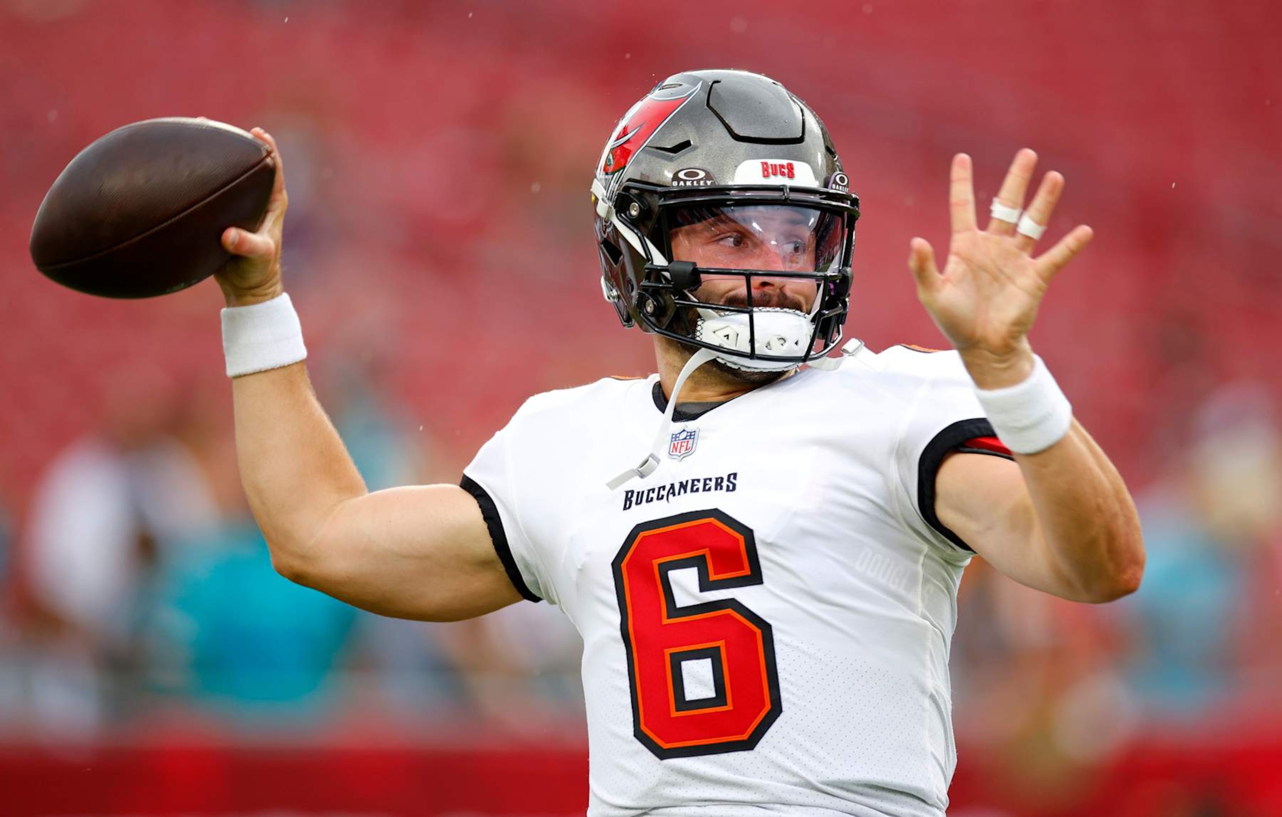 TAMPA, FLORIDA - AUGUST 23: Baker Mayfield #6 of the Tampa Bay Buccaneers warms up during a preseason game against the Miami Dolphins at Raymond James Stadium on August 23, 2024 in Tampa, Florida. (Photo by Mike Ehrmann/Getty Images) TAMPA, FLORIDA - AUGUST 23: Baker Mayfield #6 of the Tampa Bay Buccaneers warms up during a preseason game against the Miami Dolphins at Raymond James Stadium on August 23, 2024 in Tampa, Florida. (Photo by Mike Ehrmann/Getty Images)