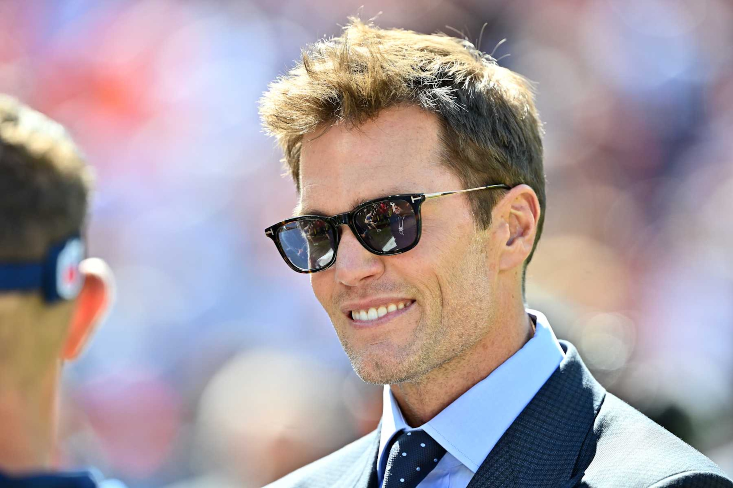 CLEVELAND, OHIO - SEPTEMBER 08: Broadcaster and former NFL quarterback Tom Brady on the field prior to a game between the Dallas Cowboys and Cleveland Browns at Cleveland Browns Stadium on September 08, 2024 in Cleveland, Ohio. (Photo by Jason Miller/Getty Images)